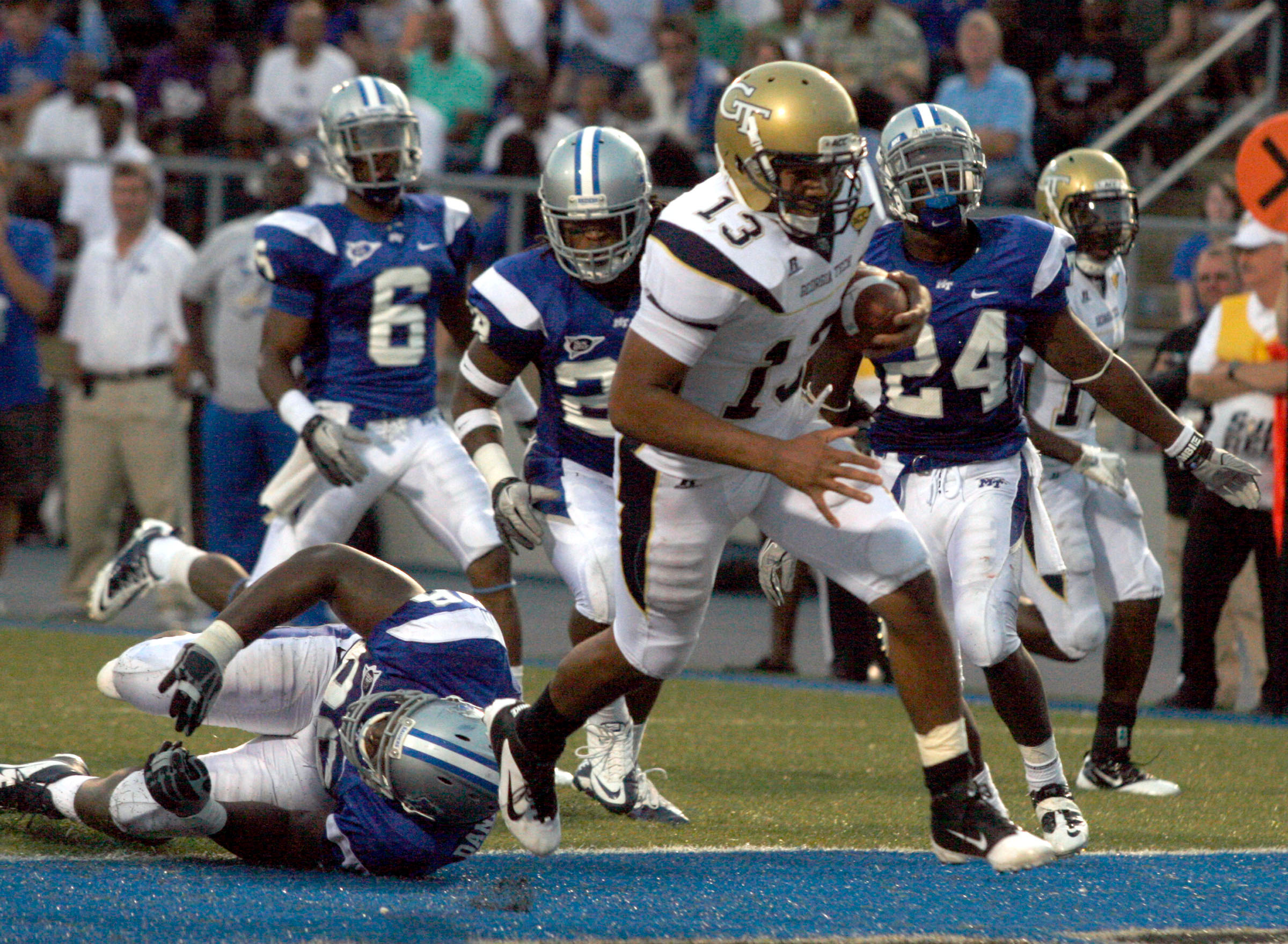 Georgia Tech quarterback Tevin Washington runs into the end zone during an NCAA college football game against Middle Tennessee, Saturday, Sept. 10, 2011, in Murfreesboro, Tenn. (AP Photo/The Daily News Journal, Aaron Thompson)