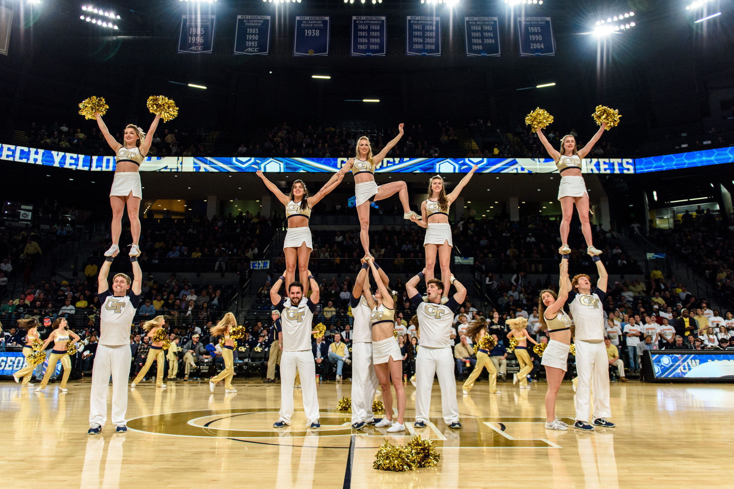 Georgia Tech Cheerleaders perform for the crowd during a timeout.
