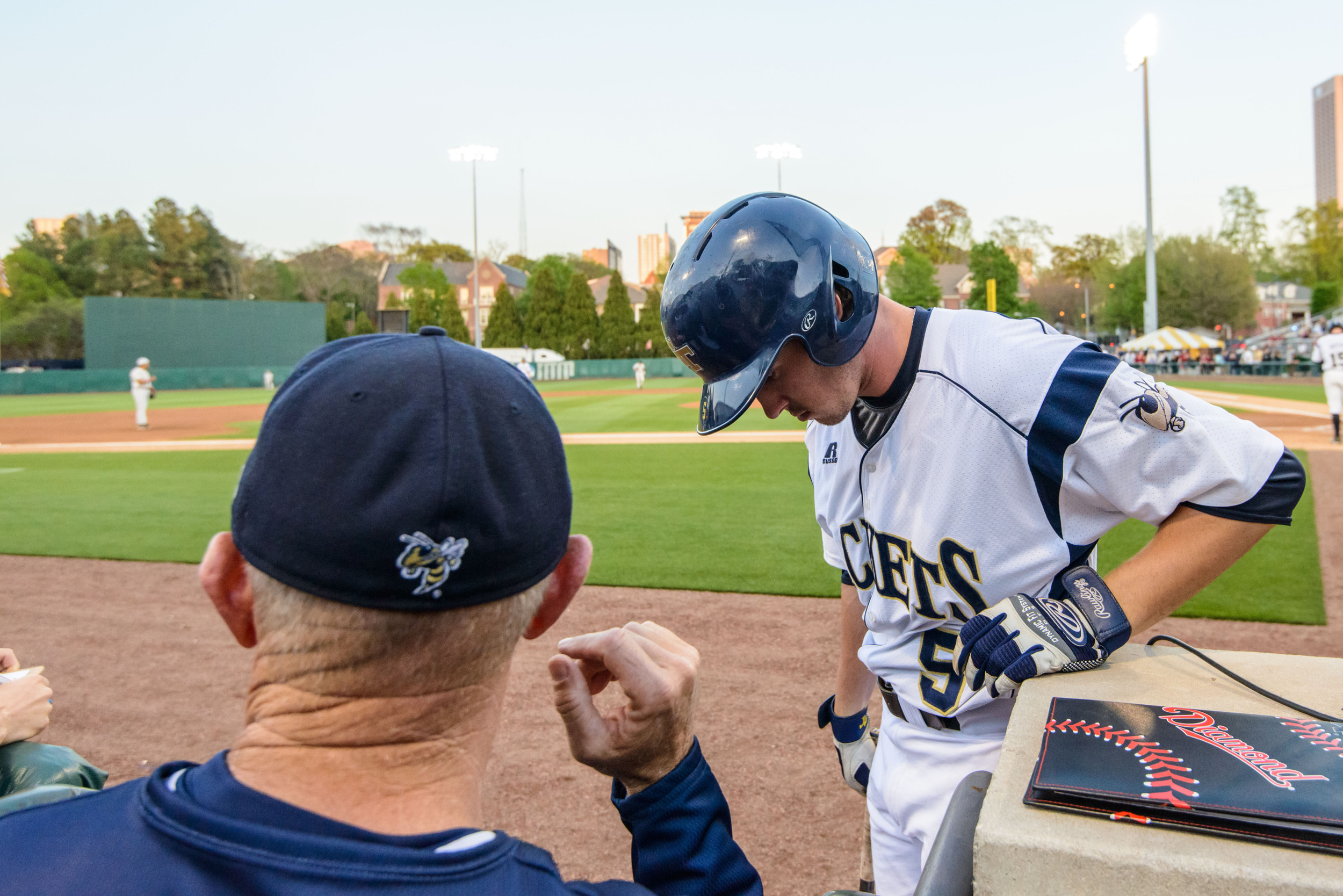 Keenan Innis (5) gets advice from Coach Hall