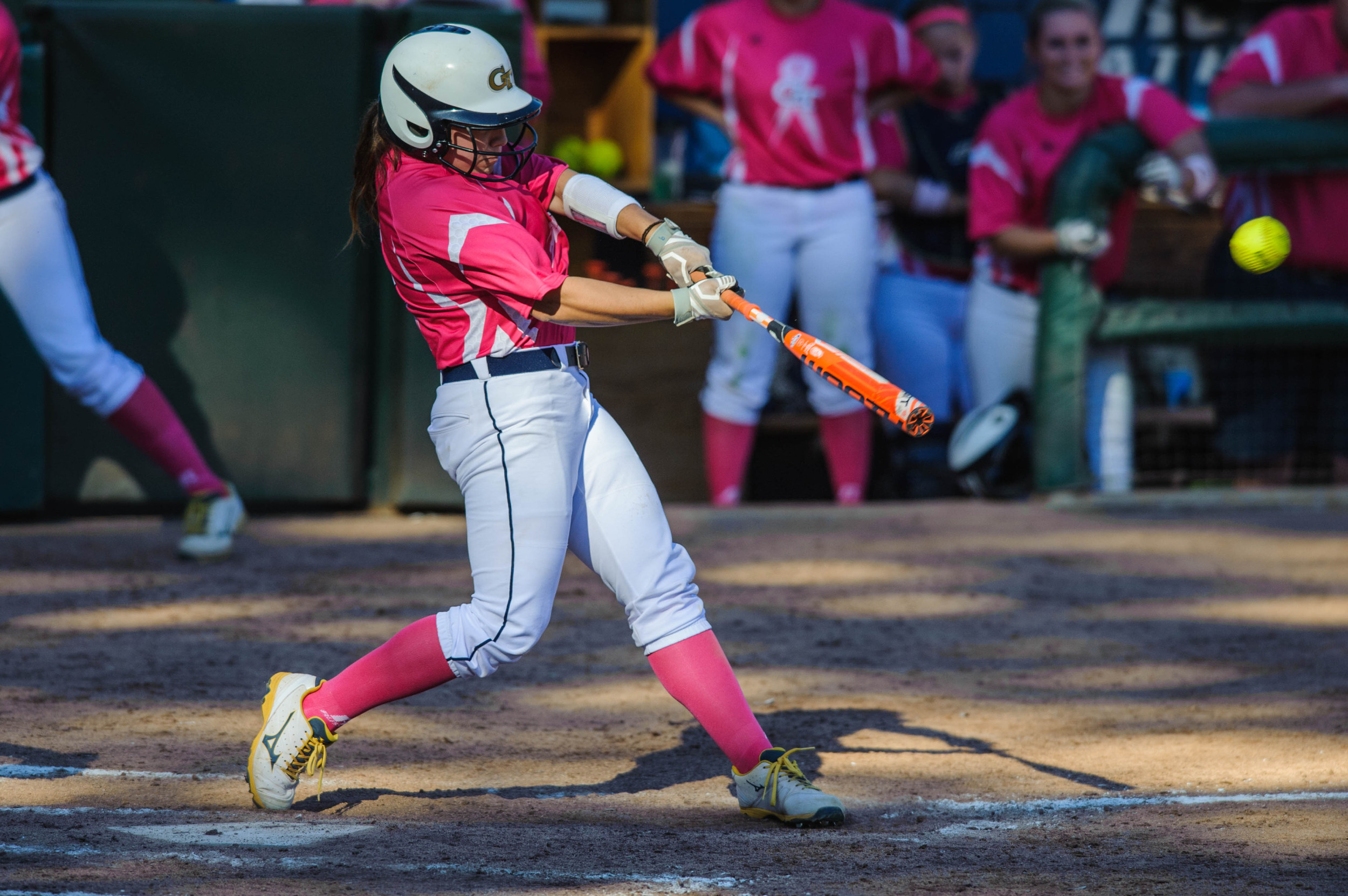 A Georgia Tech player hits the ball