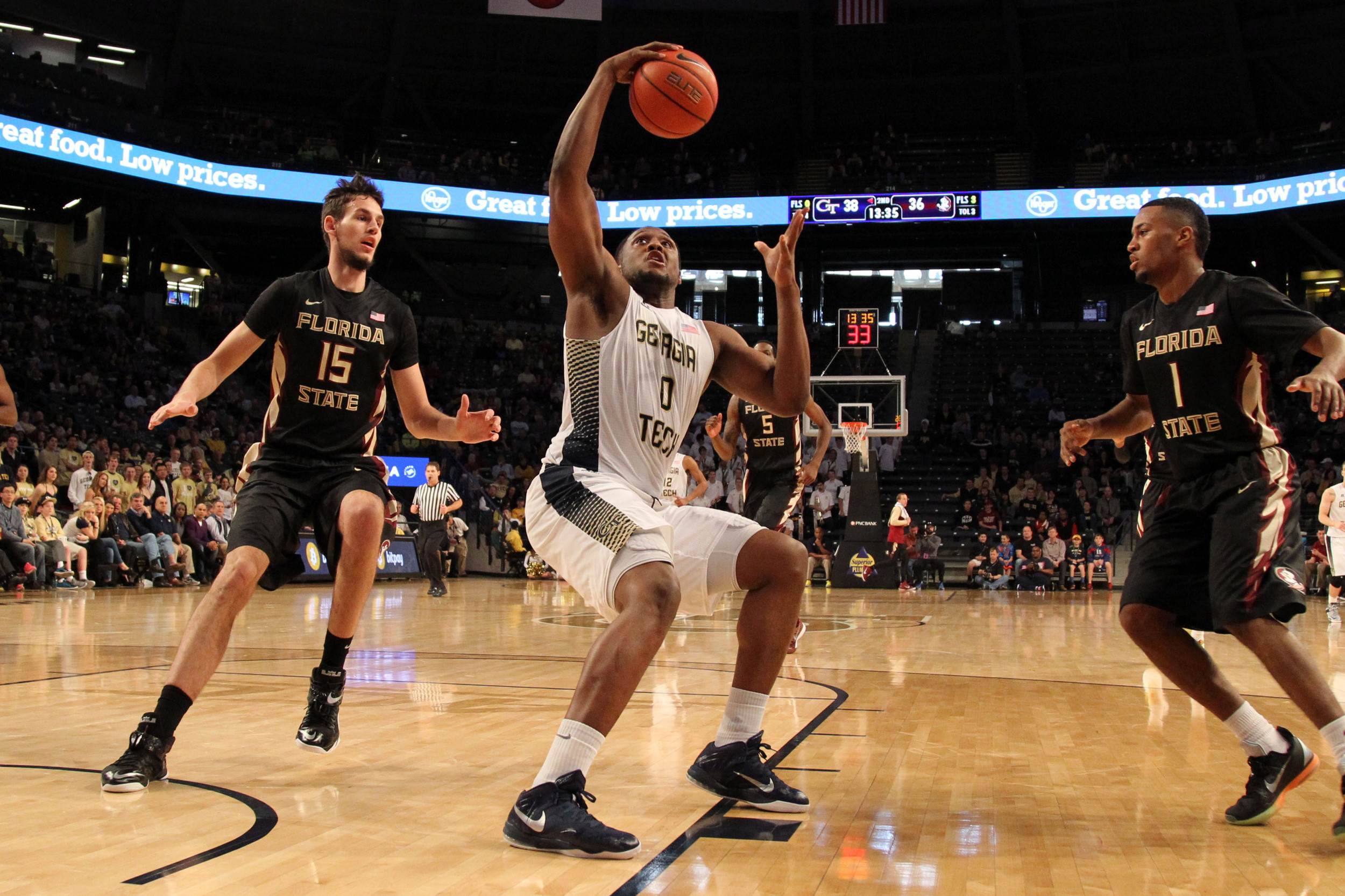 Feb 14, 2015; Atlanta, GA, USA; Georgia Tech Yellow Jackets forward Charles Mitchell (0) fakes a shot against the Florida State Seminoles in the second half at McCamish Pavilion. Florida State defeated Georgia Tech 57-53.
