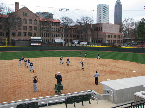 Softball team practices in its new stadium for the first time.