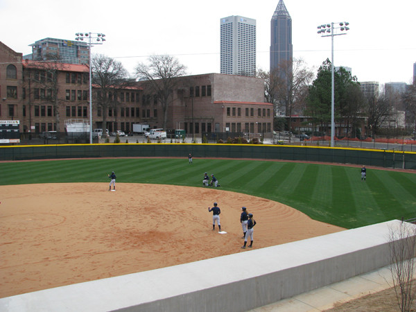 Softball team practices in its new stadium for the first time.