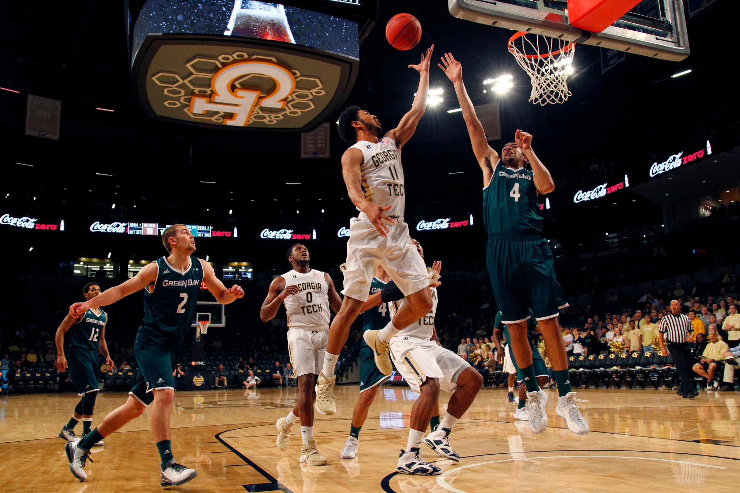 Yellow Jackets guard Josh Heath shoots the ball over Green Bay Phoenix guard Khalil Small in the first half at McCamish Pavilion. Credit: Brett Davis-USA TODAY Sports