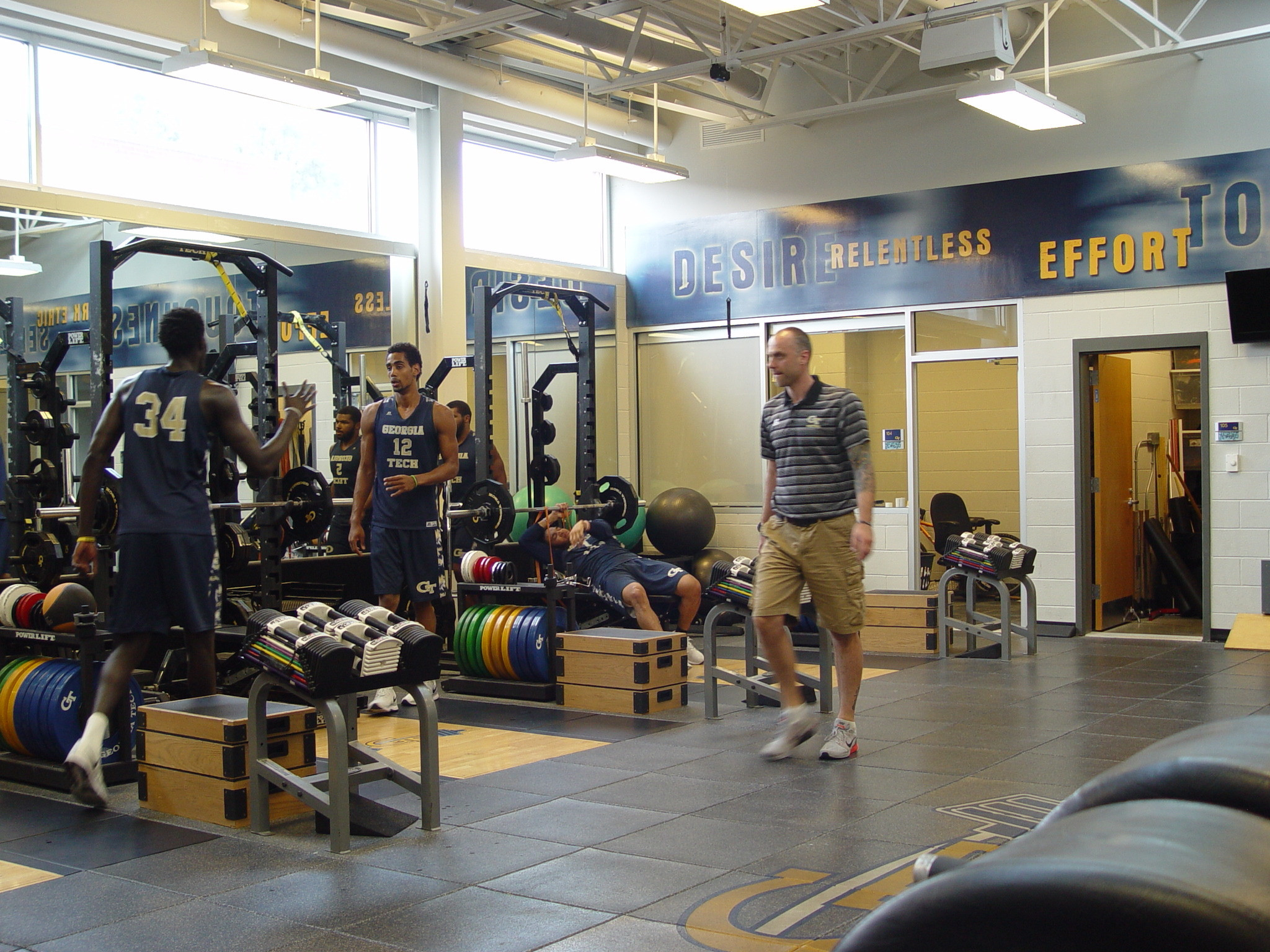 Player development coach Dan Taylor takes the Georgia Tech men's basketball team through a workout on June 16, 2016 in the Zelnak Center weight room.