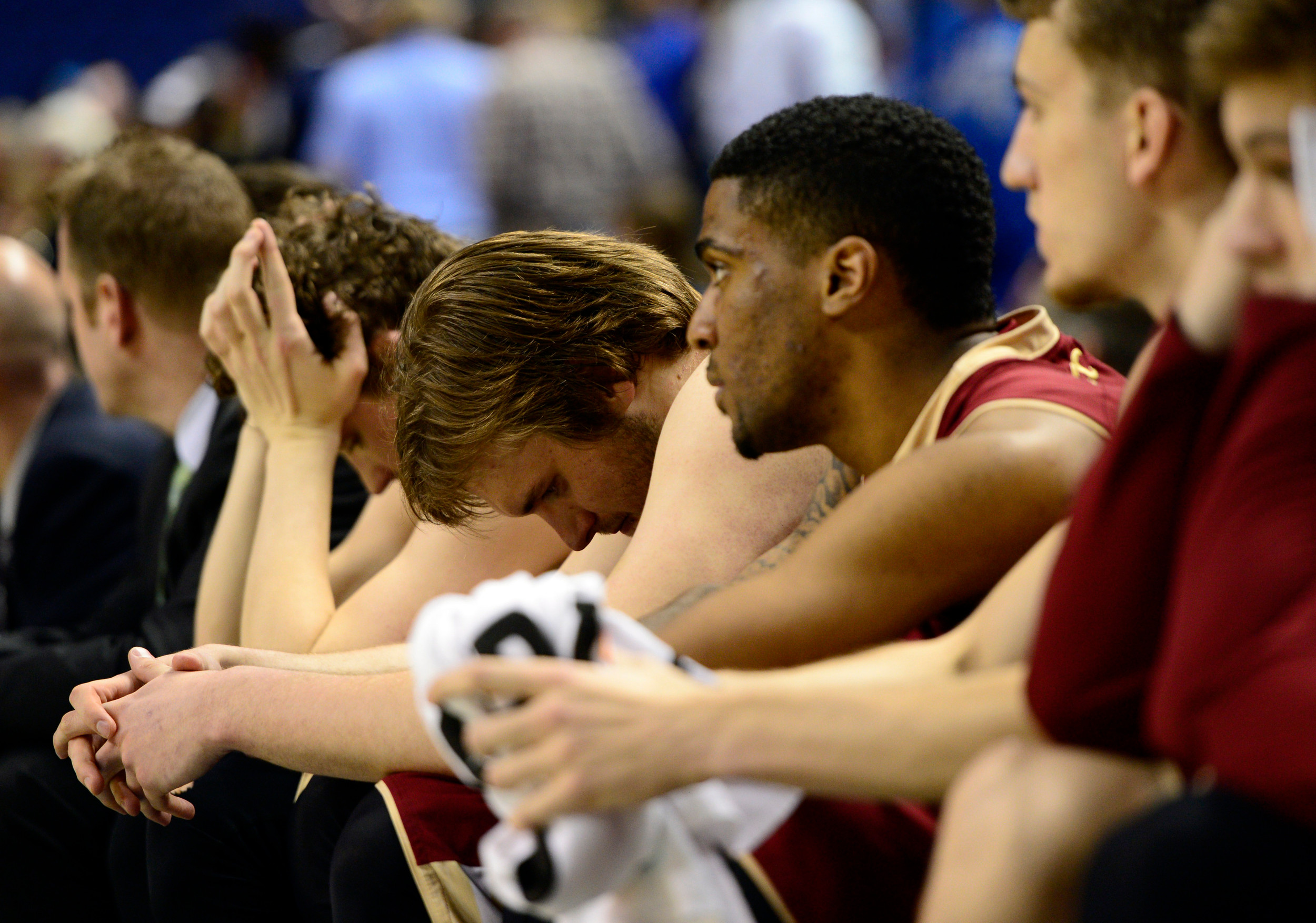 Mar 12, 2014; Greensboro, NC, USA; Boston College Eagles bench react in the final seconds of their overtime game after the game in the second half during the first round of the ACC Tournament at Greensboro Coliseum. Georgia Tech defeated Boston College 73-70 in overtime. Mandatory Credit: John David Mercer-USA TODAY Sports