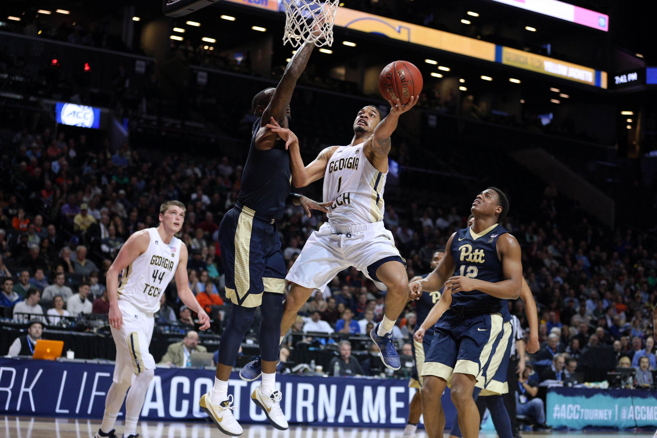 Guard Tadric Jackson drives against Pittsburgh Panthers forward Michael Young and guard Chris Jones during the first half of an ACC Conference Tournament game at Barclays Center. Credit: Brad Penner-USA TODAY Sports