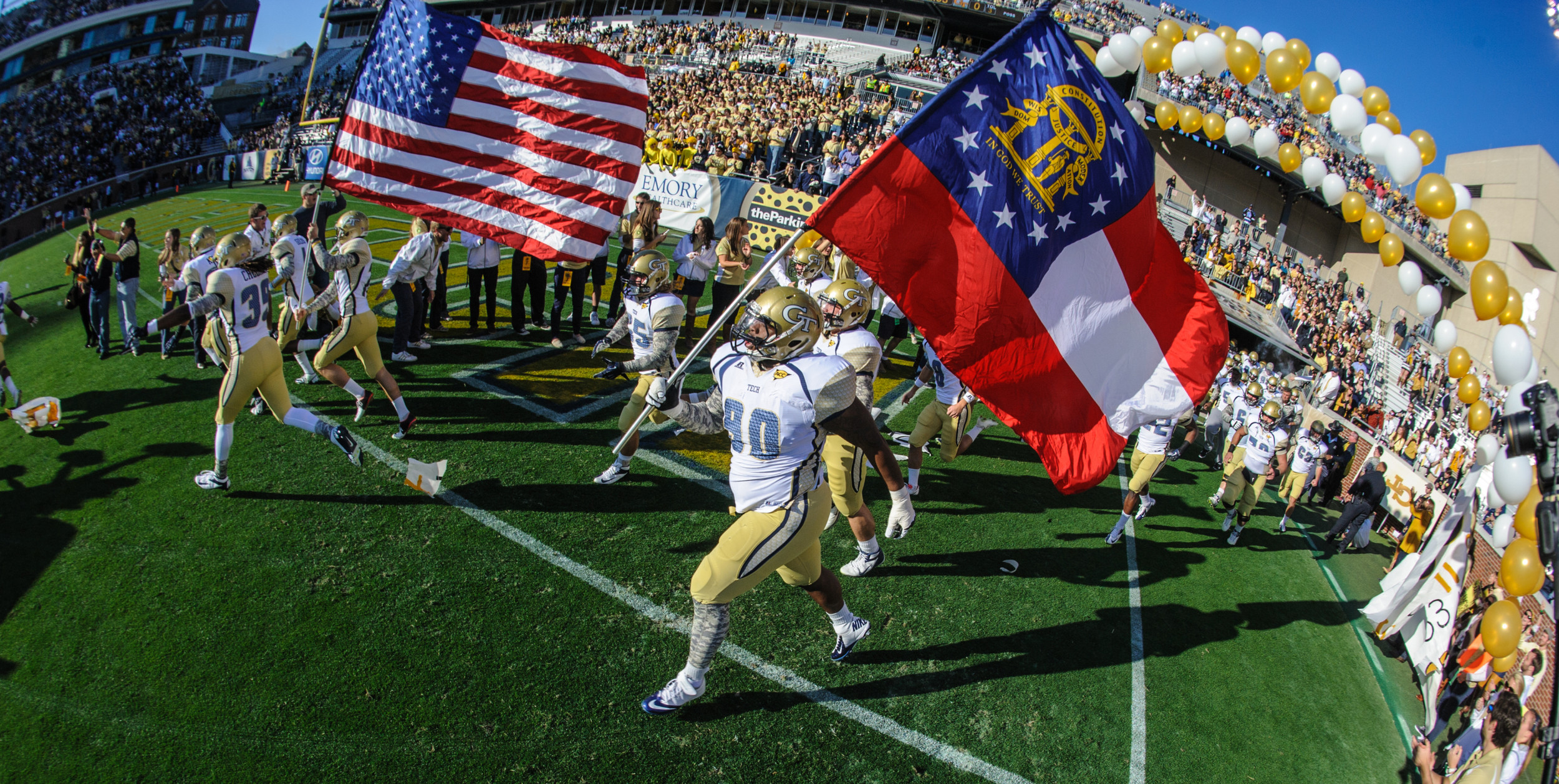 The Yellow Jackets take the field.