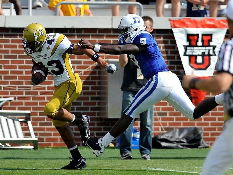 Alex Walker (43) returns an interception 30 yards against Duke.