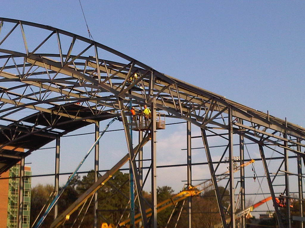 Week 12 - Photo taken on March 22, 2011 - Roof decking work continues on the Indoor Practice Facility