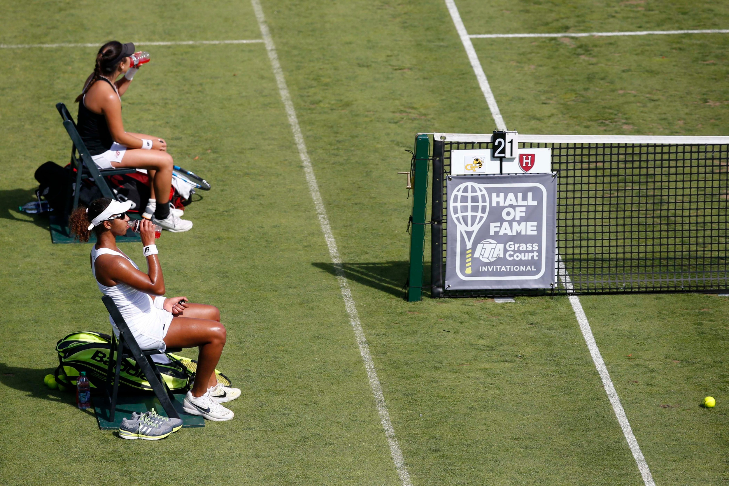 Georgia Tech's Rasheeda MacAdoo and Harvard's June Lee take a break during a match at the Hall of Fame Tennis Club. Credit: Greg M. Cooper-USA TODAY Sports