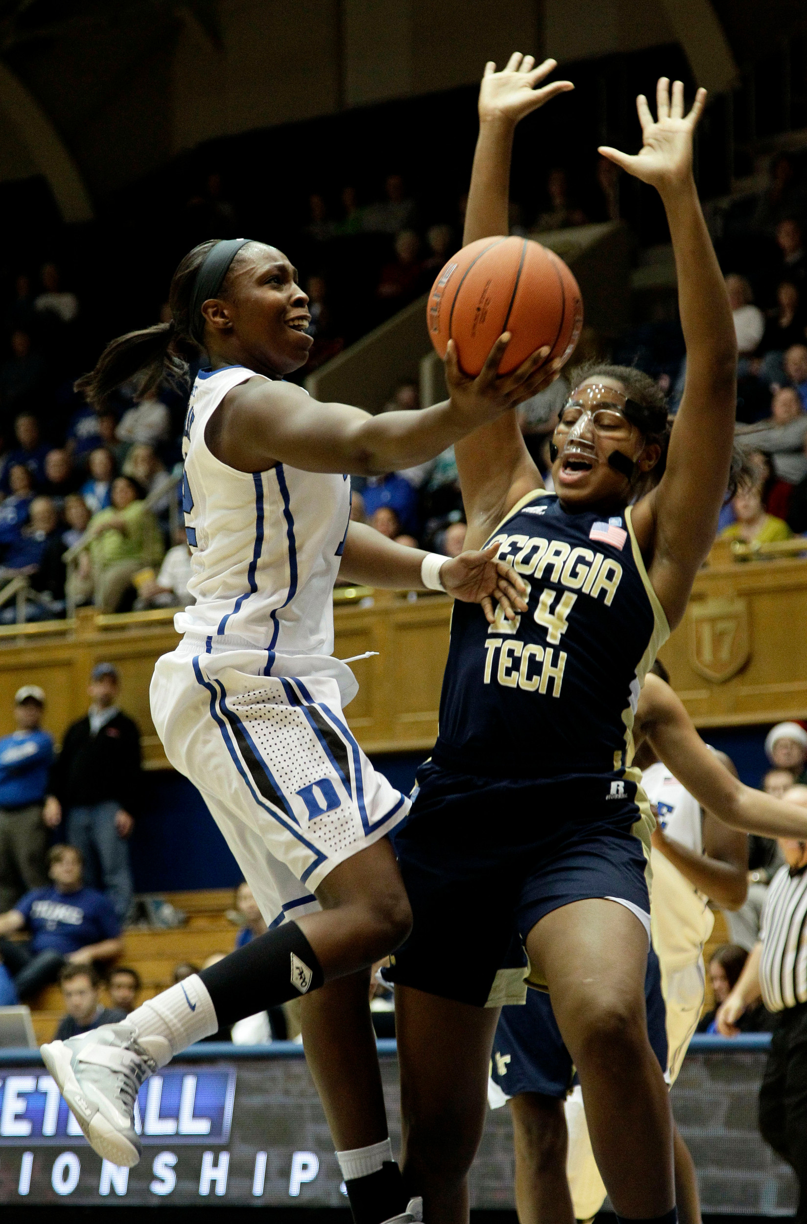 Duke's Chelsea Gray drives to the basket against Georgia Tech's Shayla Bivins (24) during the first half of an NCAA women's college basketball game in Durham, N.C., Thursday, Dec. 6, 2012. (AP Photo/Gerry Broome)
