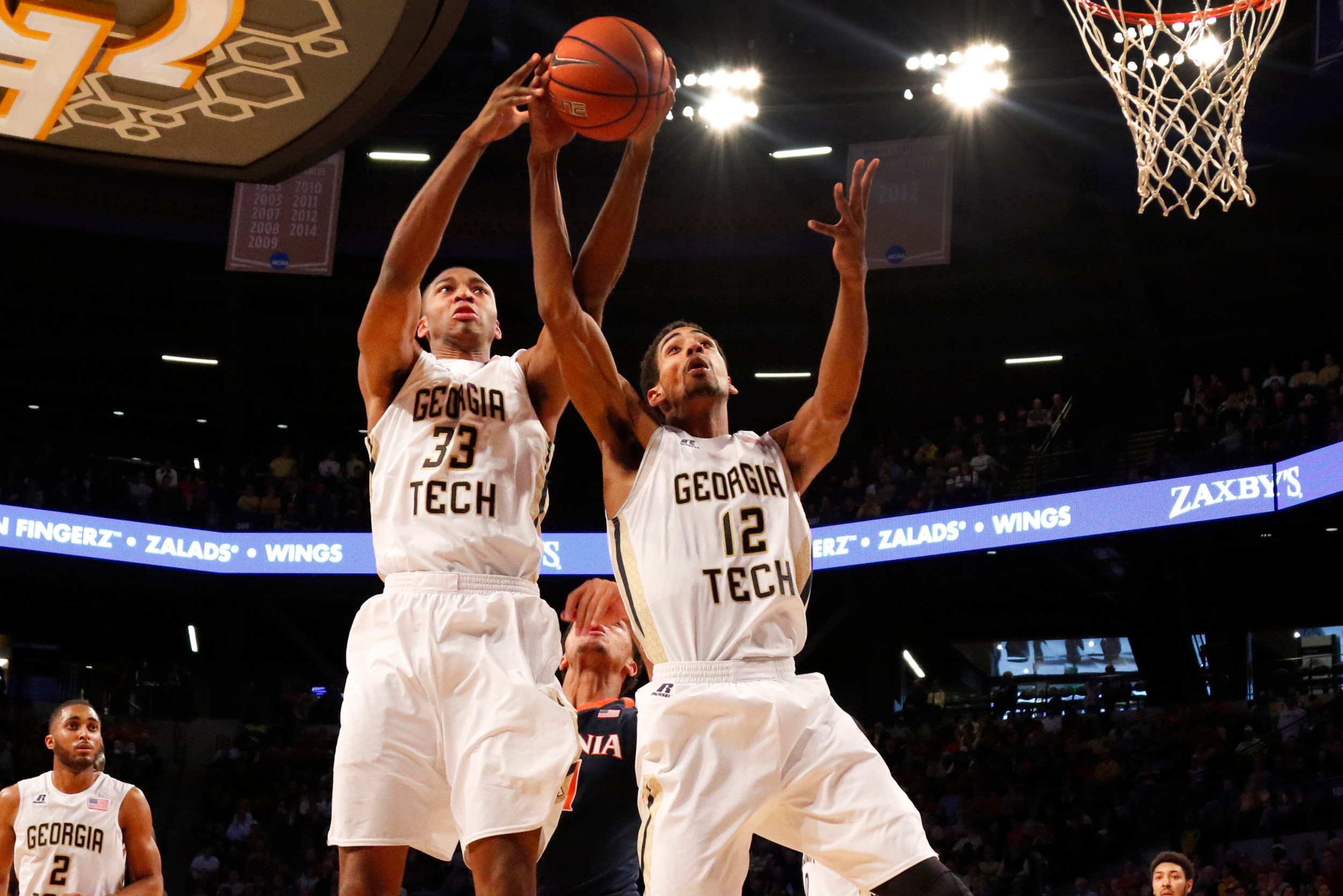 James White and forward Quinton Stephens reach for a rebound. Brett Davis-USA TODAY Sports