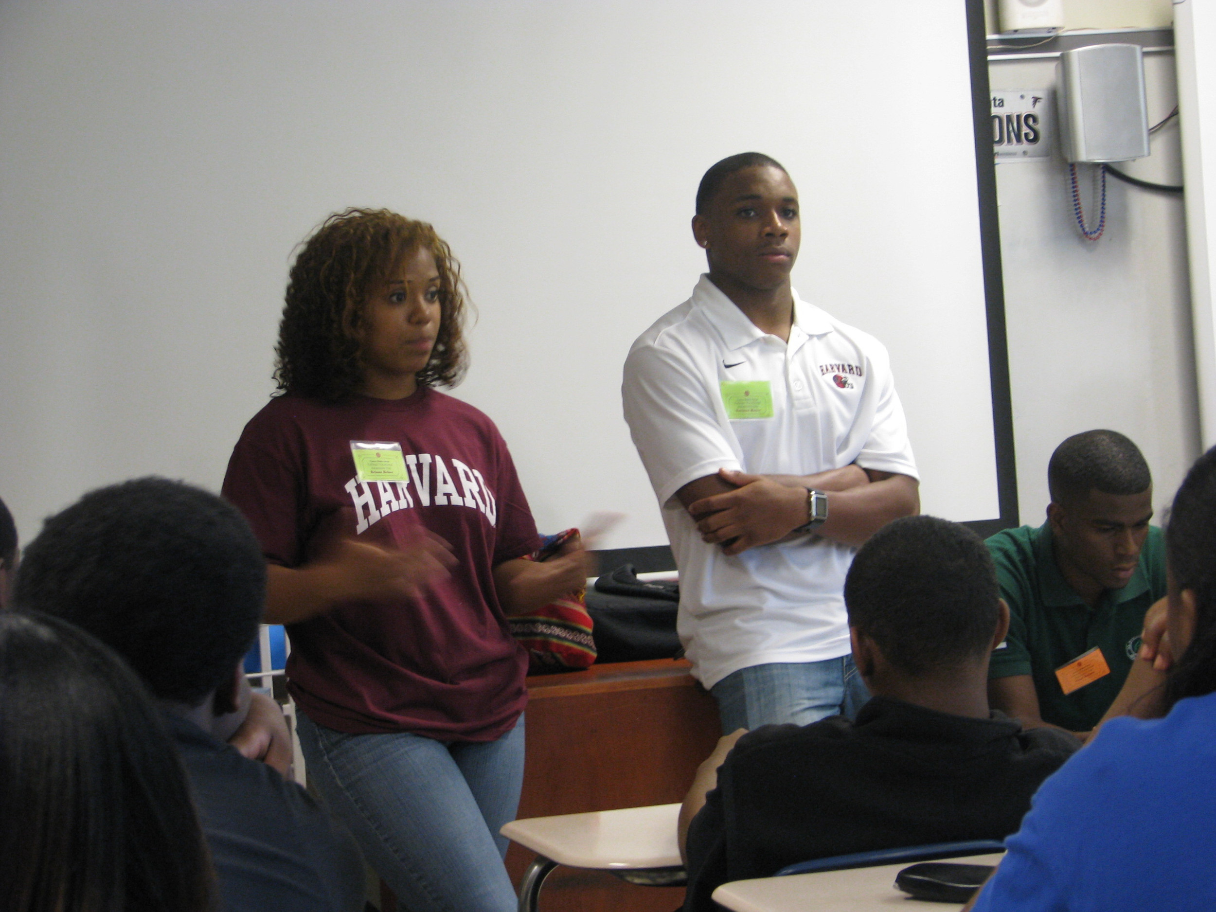 Mfon Udofia joins college students from the area speaking to Tucker Middle School pupils about college life.