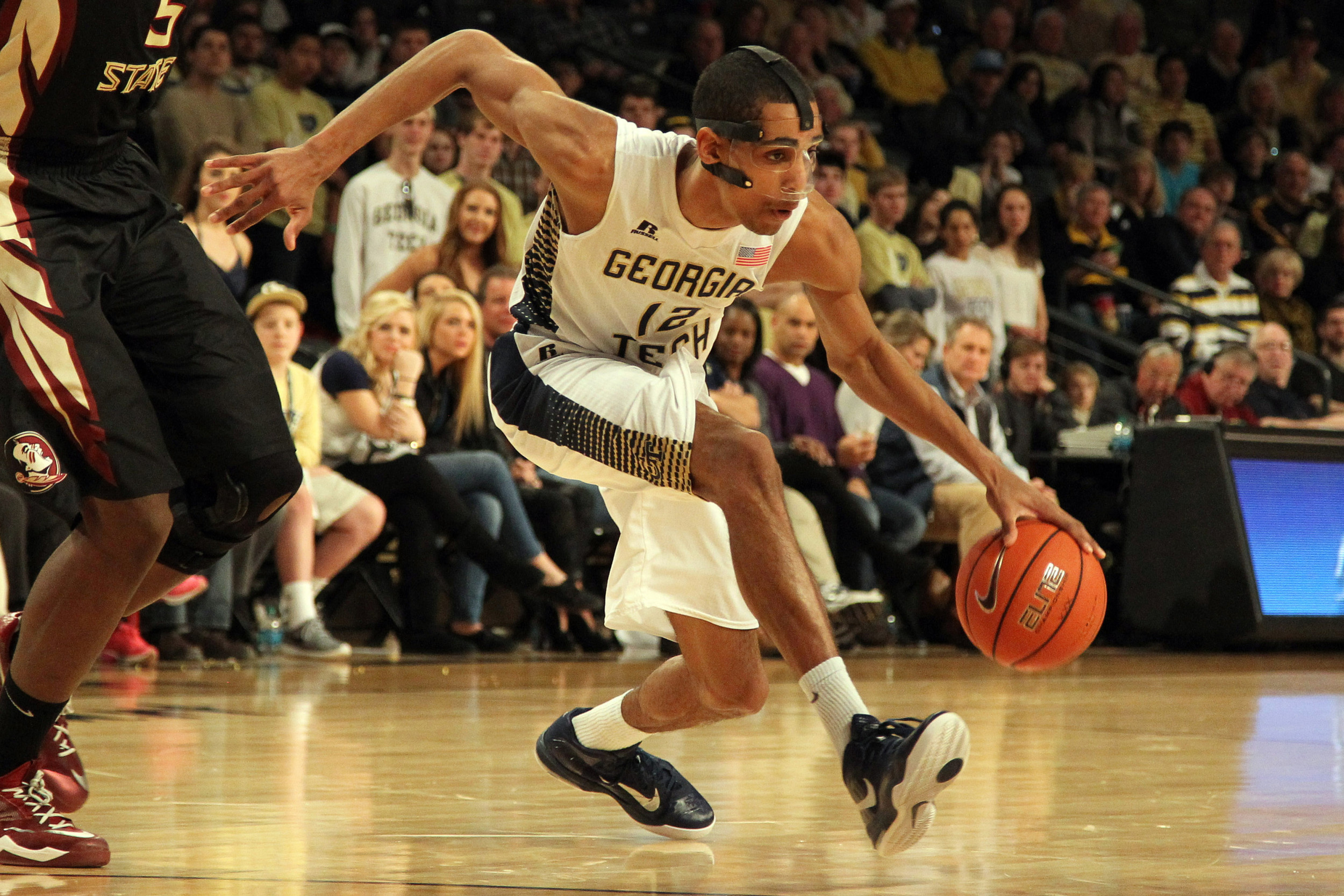 Feb 14, 2015; Atlanta, GA, USA; Georgia Tech Yellow Jackets forward Quinton Stephens (12) dribbles the ball against the Florida State Seminoles in the second half at McCamish Pavilion. Florida State defeated Georgia Tech 57-53.