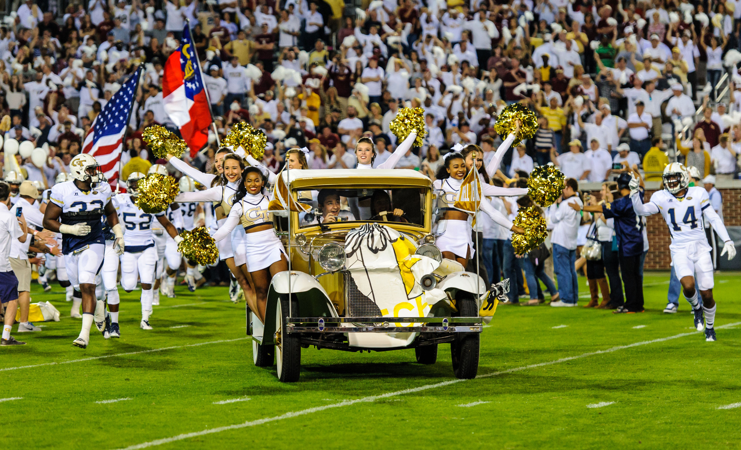 The Ramblin' Reck leads the team onto the field