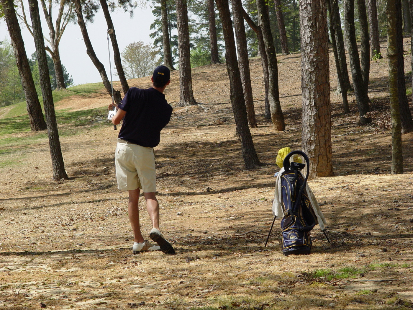 Chesson Hadley punches his second shot through the trees at the ninth hole during round two of the ACC Golf Championship, April 19, 2008.