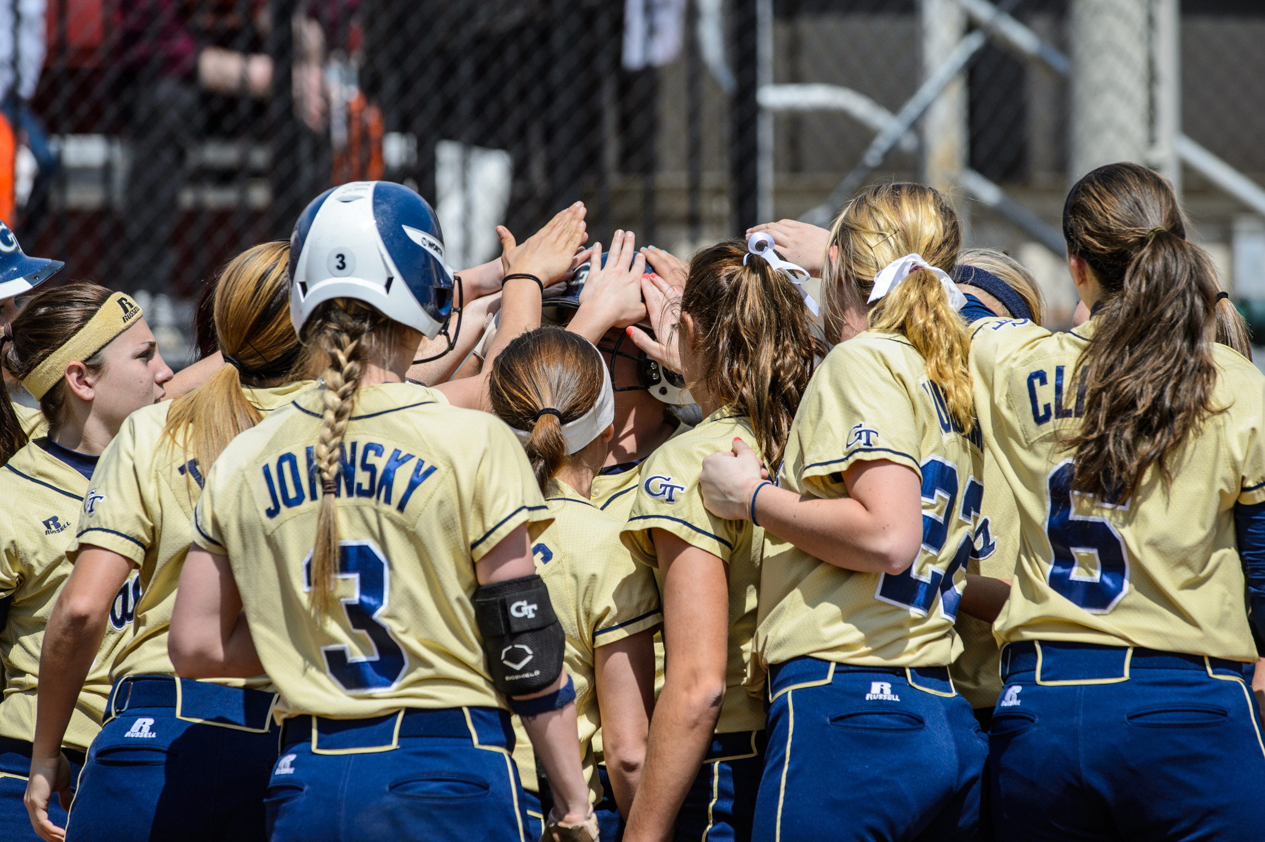 The team celebrates Hope Rush's home run.