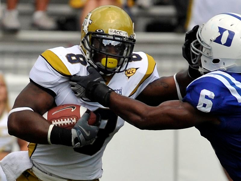Demaryius Thomas (8) uses a stiff arm against a Duke defender.