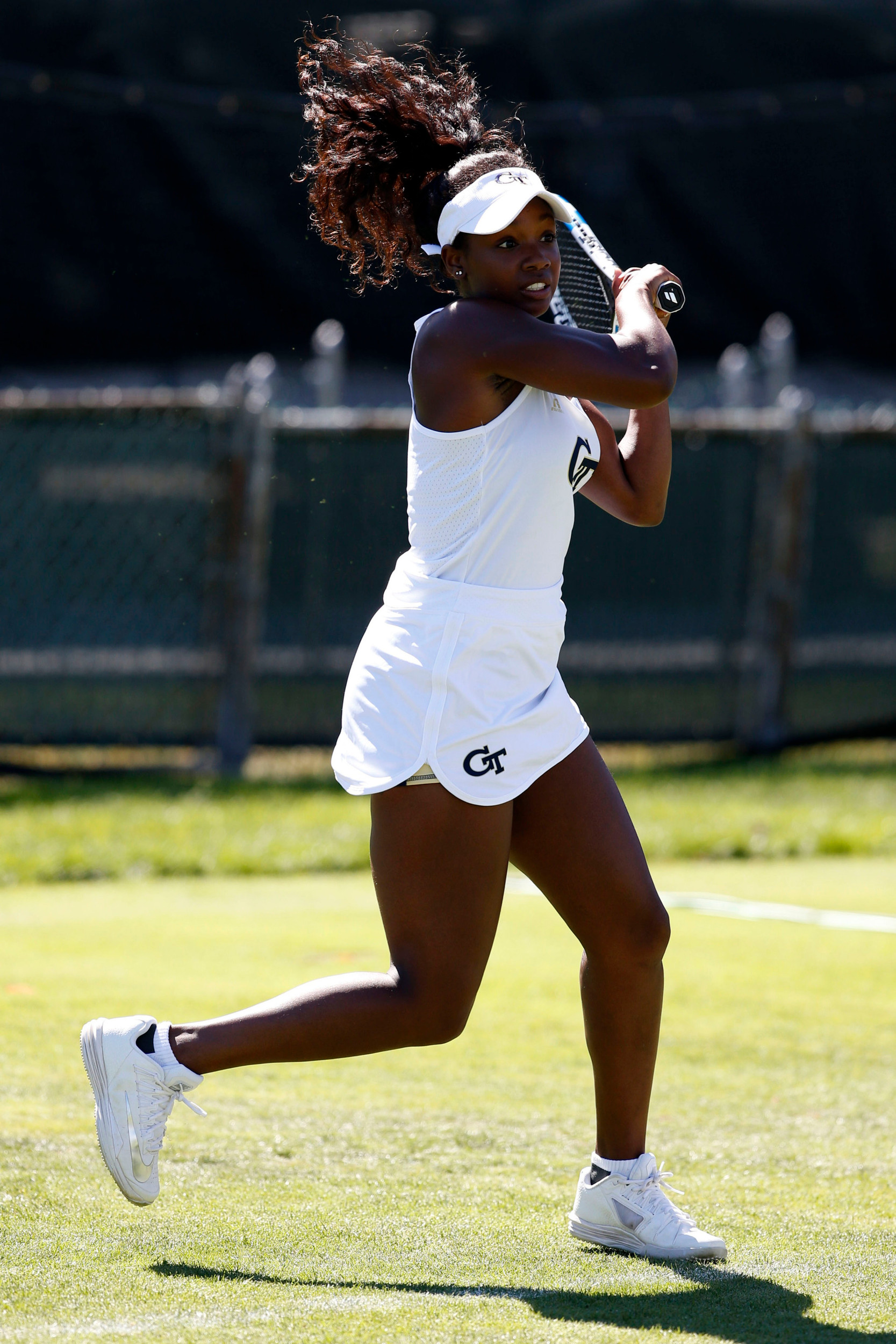 Kenya Jones makes a return during a match at the Hall of Fame Tennis Club. Credit: Greg M. Cooper-USA TODAY Sports