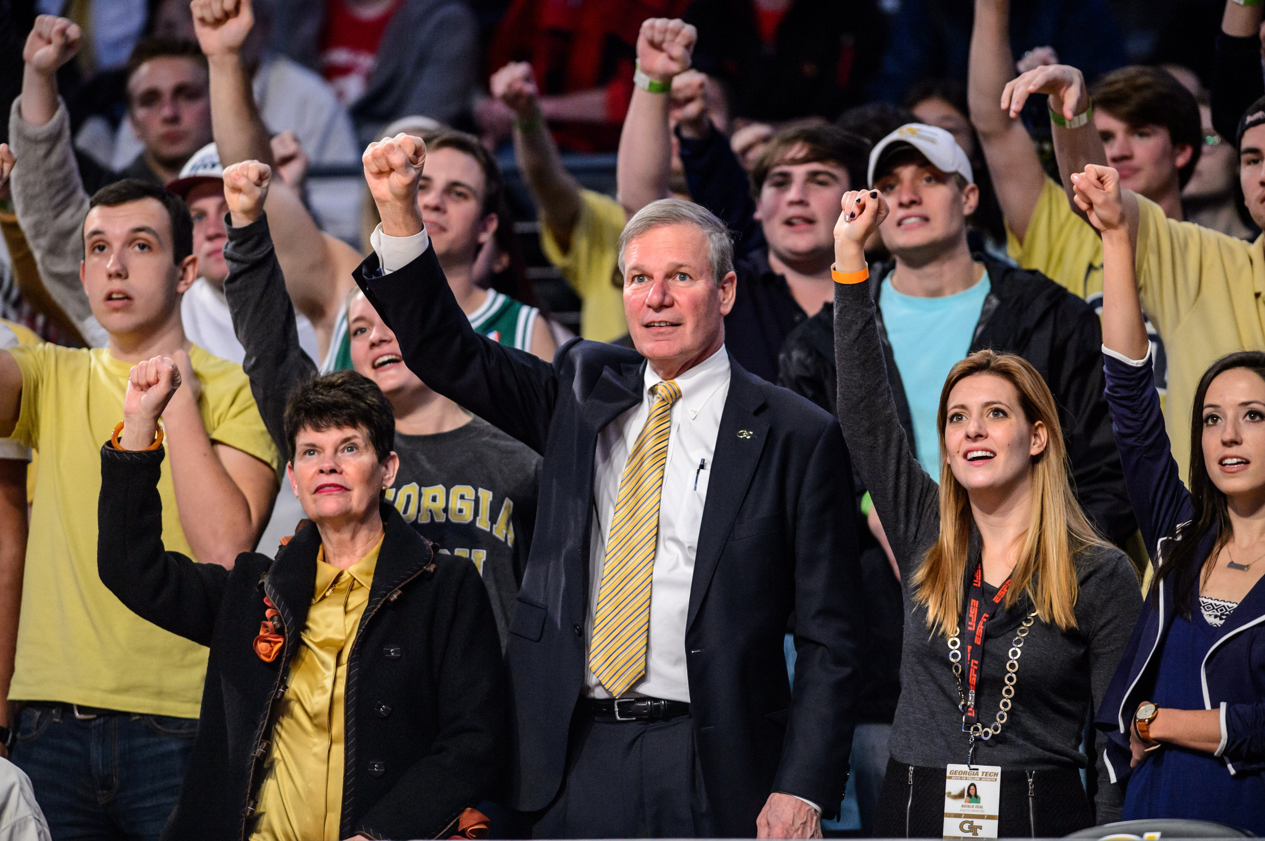 President Bud Peterson cheers on the team