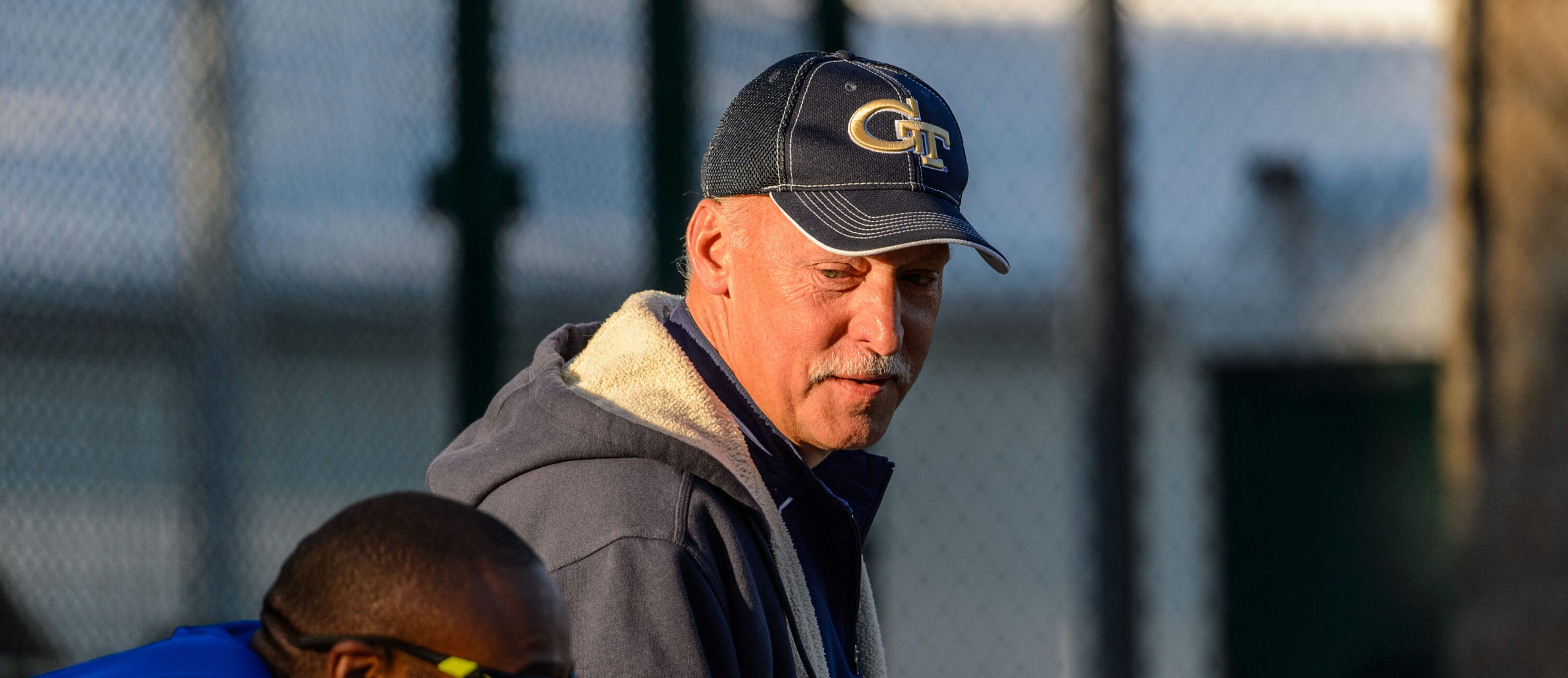 Head Coach Grover Hinsdale talks with Angelo Taylor