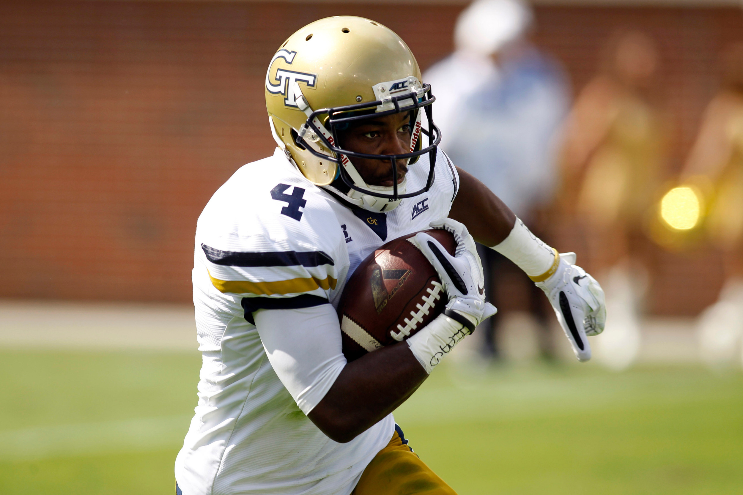 Yellow Jackets defensive back Jamal Golden (4) returns a kick against the Duke Blue Devils (Brett Davis-USA TODAY Sports)