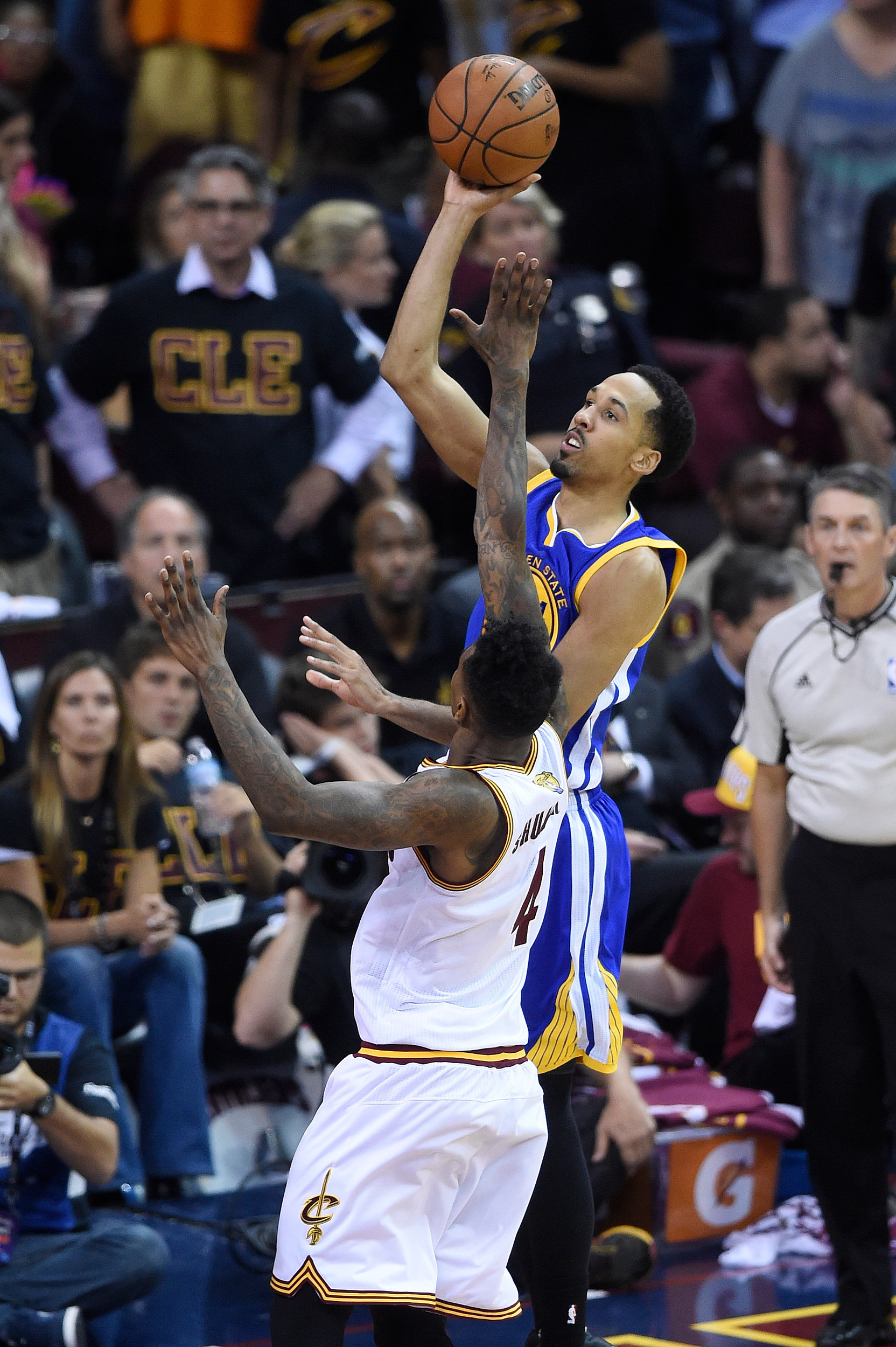 Jun 16, 2016; Cleveland, OH, USA; Golden State Warriors guard Shaun Livingston (34) shoots the ball over Cleveland Cavaliers guard Iman Shumpert (4) during game six of the NBA Finals. Credit: David Richard-USA TODAY Sports