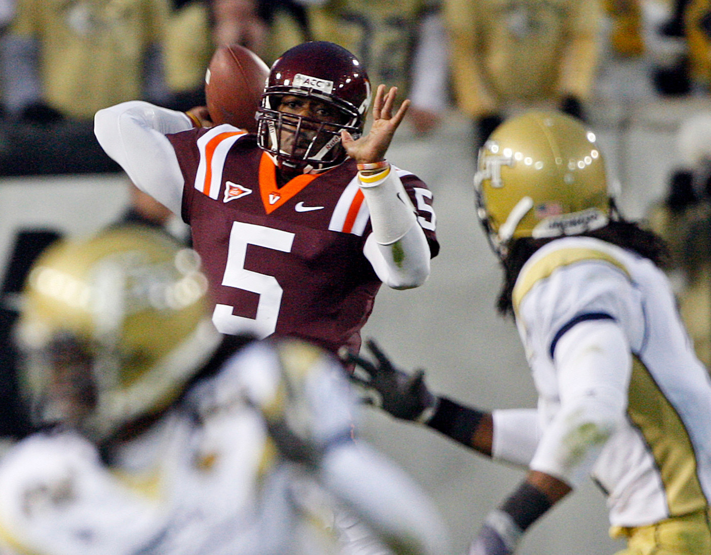 Virginia Tech quarterback Tyrod Taylor (5) looks for an open receiver during the second quarter of an NCAA college football game against Georgia Tech in Atlanta, Saturday, Oct. 17, 2009. (AP Photo/John Bazemore)