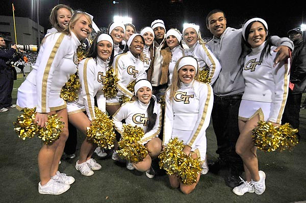 Music start T.I. and the Georgia Tech cheerleaders pose for photos. (Photo by Lenseffects)