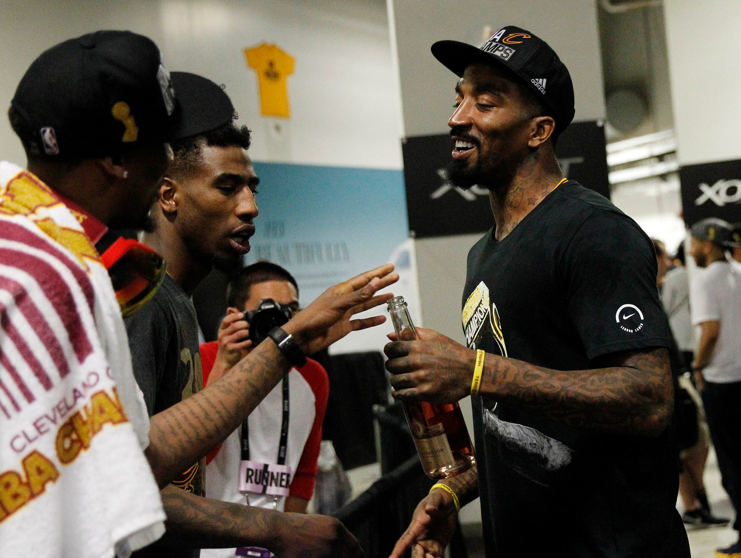 June 19, 2016; Oakland, CA, USA; Cleveland Cavaliers guard J.R. Smith (5) and guard Iman Shumpert (4) celebrate the 93-89 victory against the Golden State Warriors in game seven of the NBA Finals at Oracle Arena. Mandatory Credit: Cary Edmondson-USA TODAY Sports