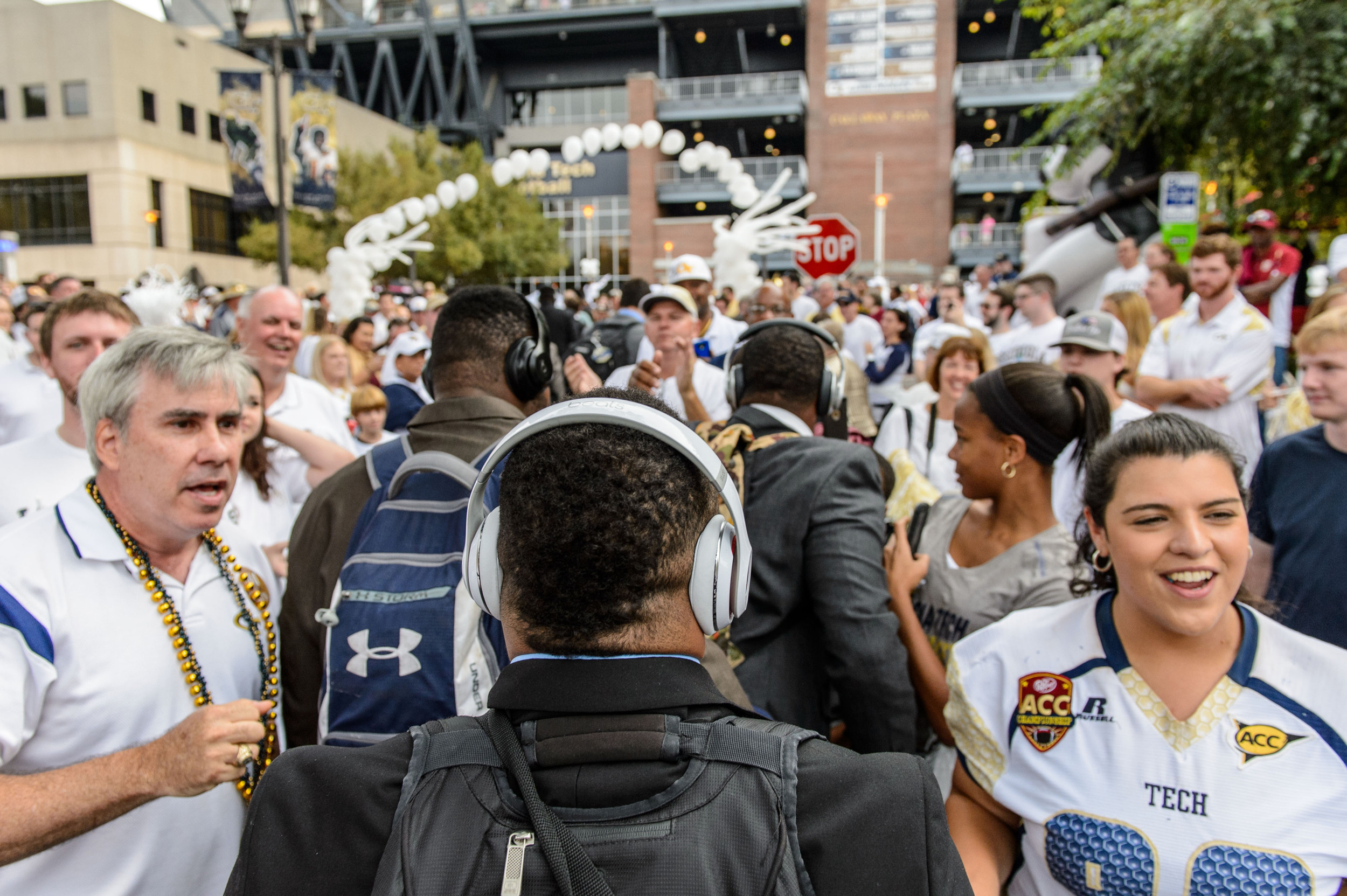 Tre' Jackson (25) walks down Yellow Jacket Alley