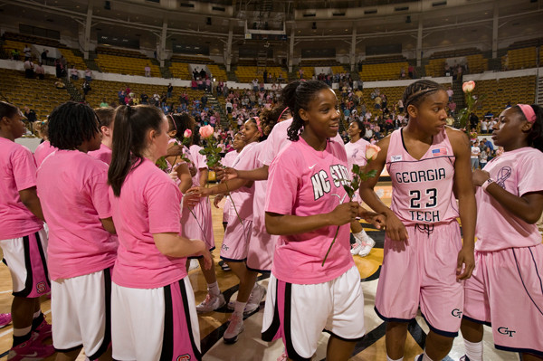 The Yellow Jackets handed roses to the NC State players prior to the game
