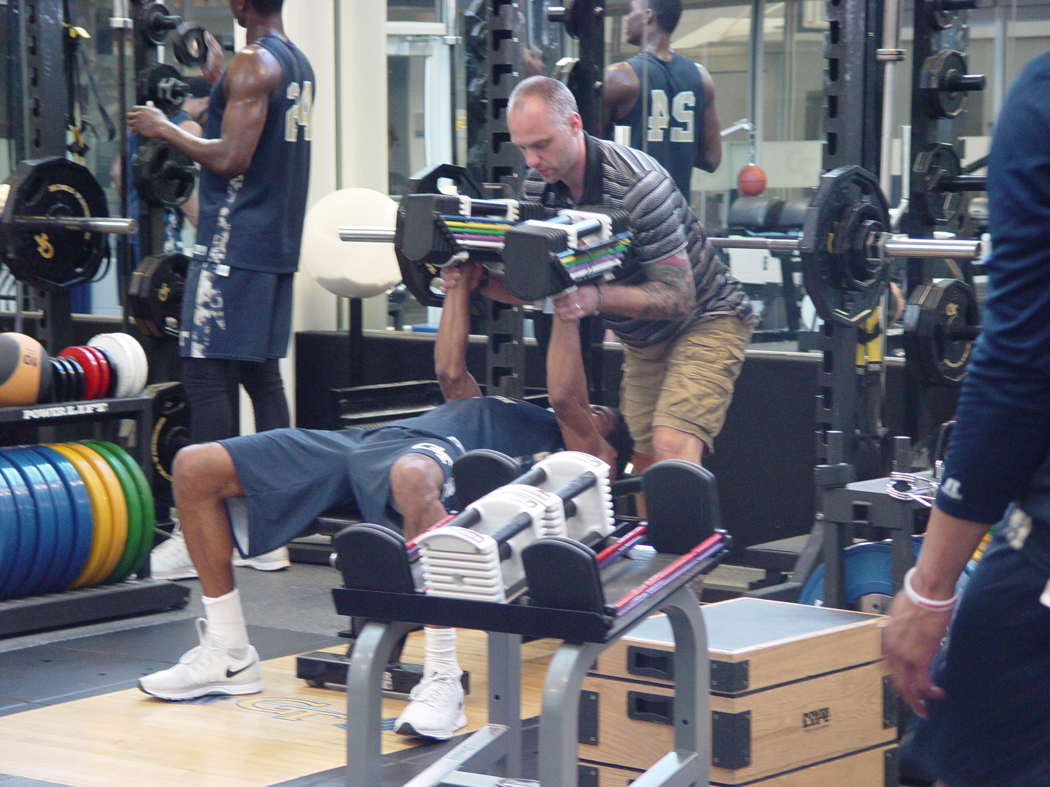 Player development coach Dan Taylor takes the Georgia Tech men's basketball team through a workout on June 16, 2016 in the Zelnak Center weight room.