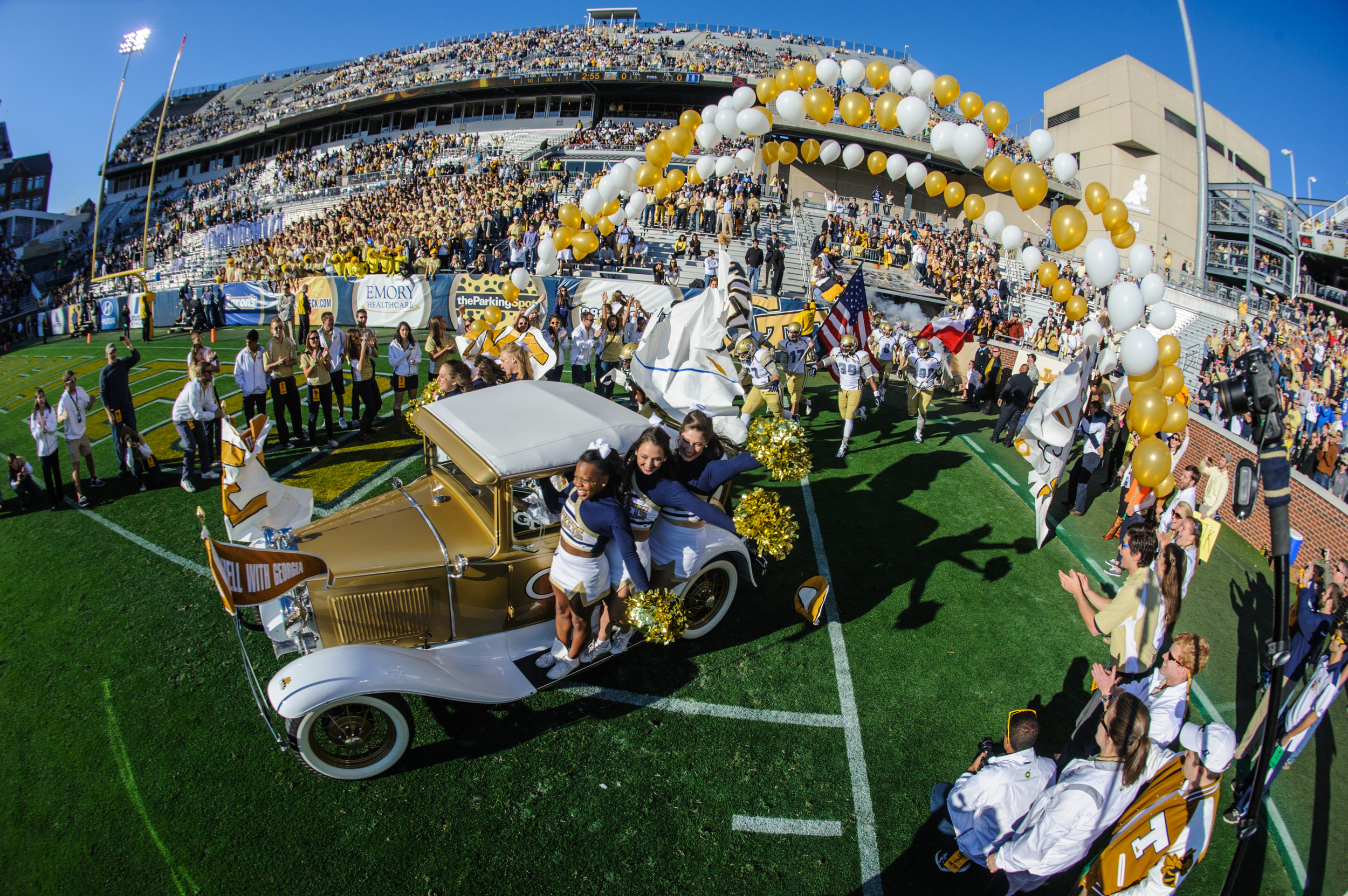The Ramblin' Reck leads the team onto the field.