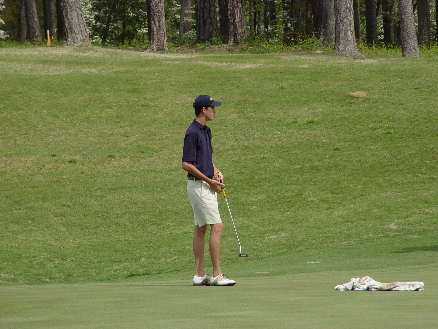 Chesson Hadley backs off his putt at the sound of a boat motor starting near the sixth green during round two of the ACC Golf Championship, April 19, 2008. Hadley made the birdie putt.
