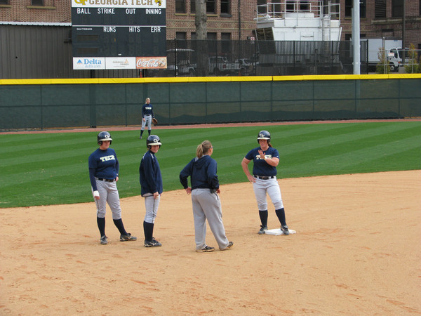 Softball team practices in its new stadium for the first time.