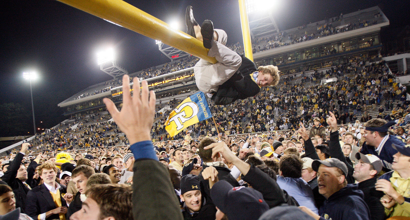 Georgia Tech students tear down the goalpost after the Yellow Jackets' 28-23 win over Virginia Tech in an NCAA college football game in Atlanta, Saturday, Oct. 17, 2009. (AP Photo/John Bazemore)