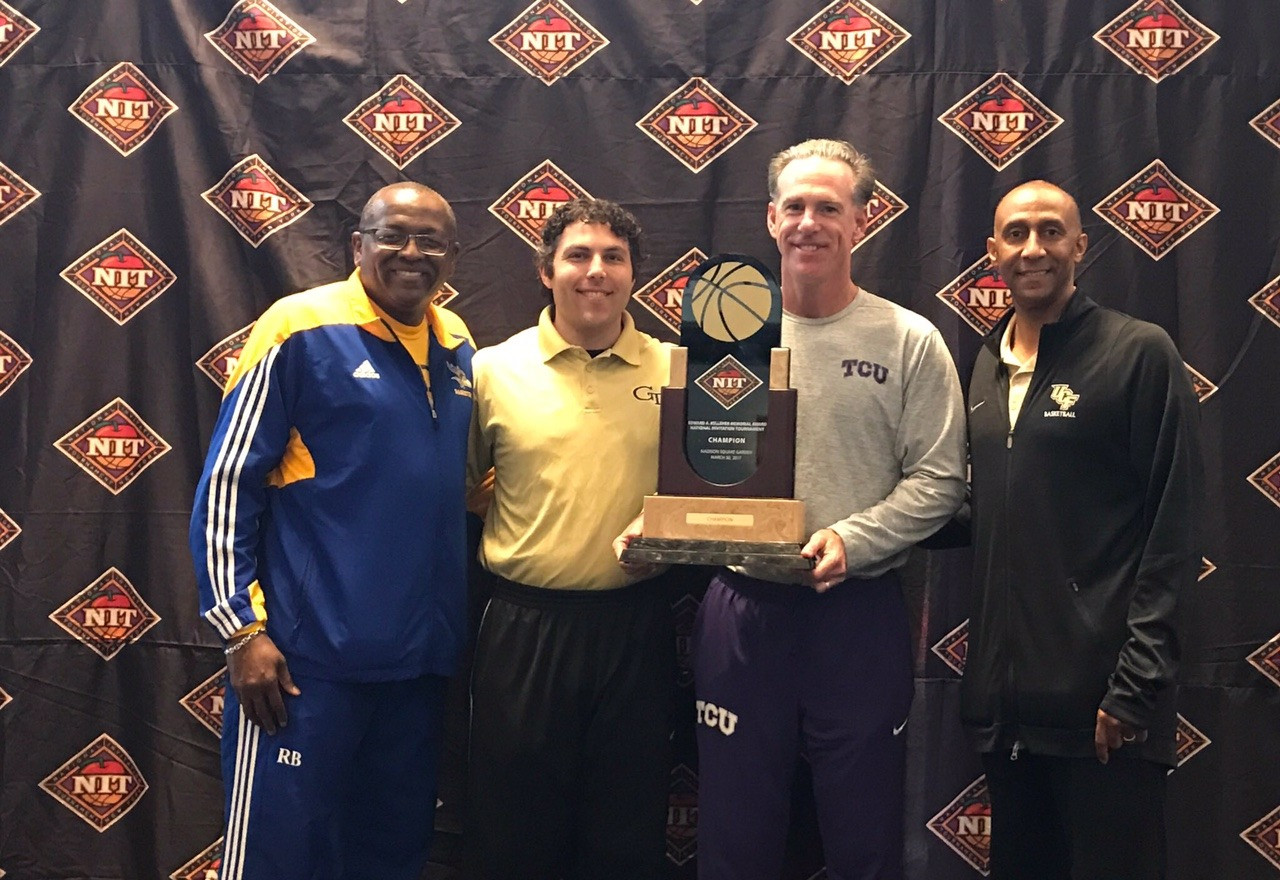 The four head coaches - Rod Barnes of CSU Bakersfield, Tech coach Josh Pastner, Jamie Dixon of TCU and Johnny Dawkins of UCF with the NIT championship trophy.