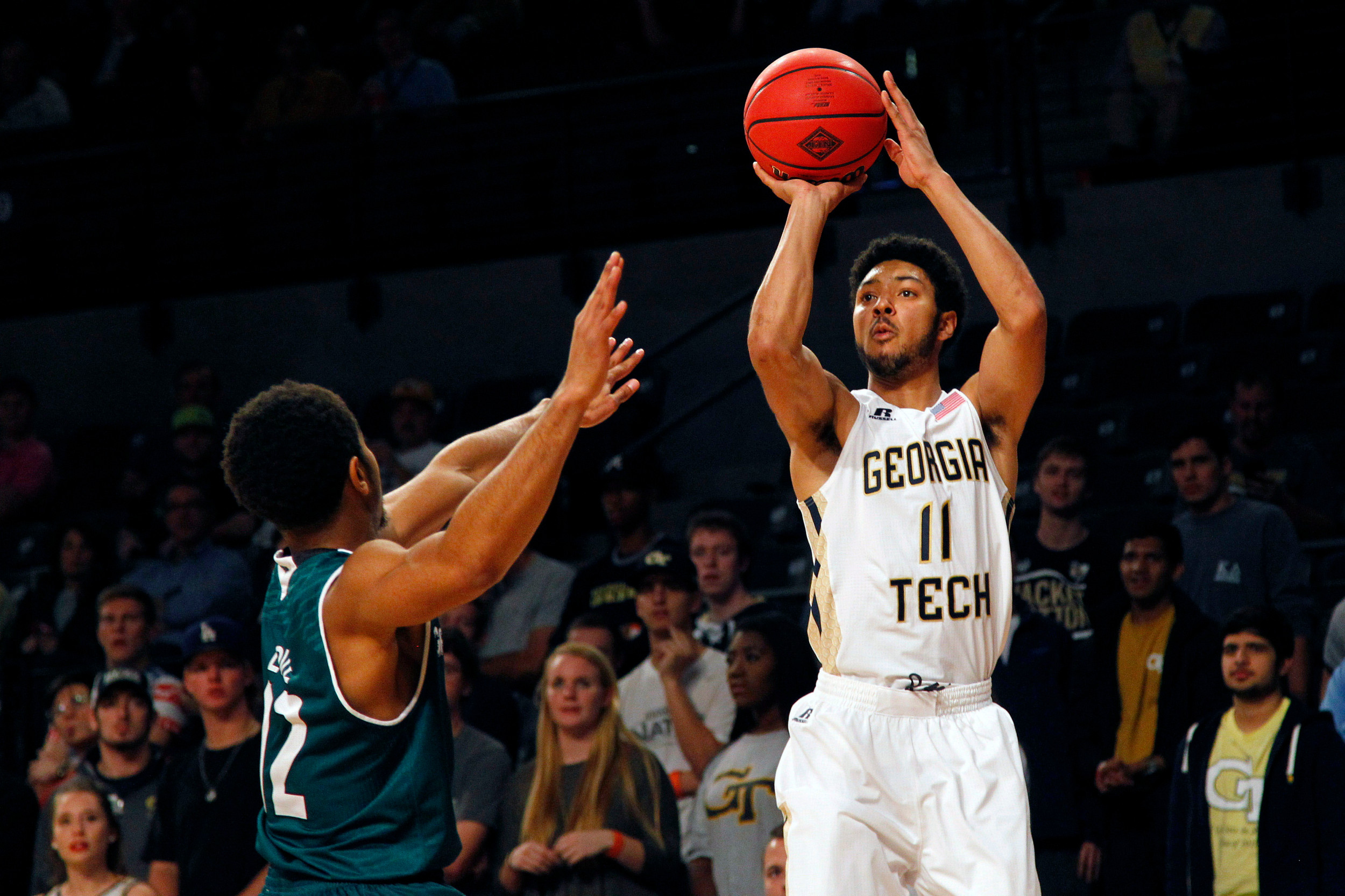 Yellow Jackets guard Josh Heath shoots the ball over Green Bay Phoenix guard Carrington Love in the first half at McCamish Pavilion. Credit: Brett Davis-USA TODAY Sports