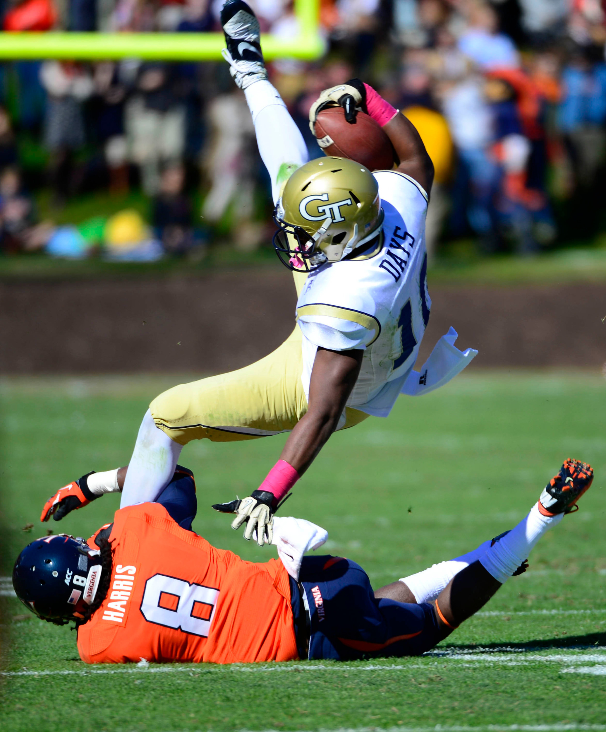 Synjyn Days (10) is tackled by Virginia Cavaliers safety Anthony Harris (8). Mandatory Credit: Bob Donnan-USA TODAY Sports