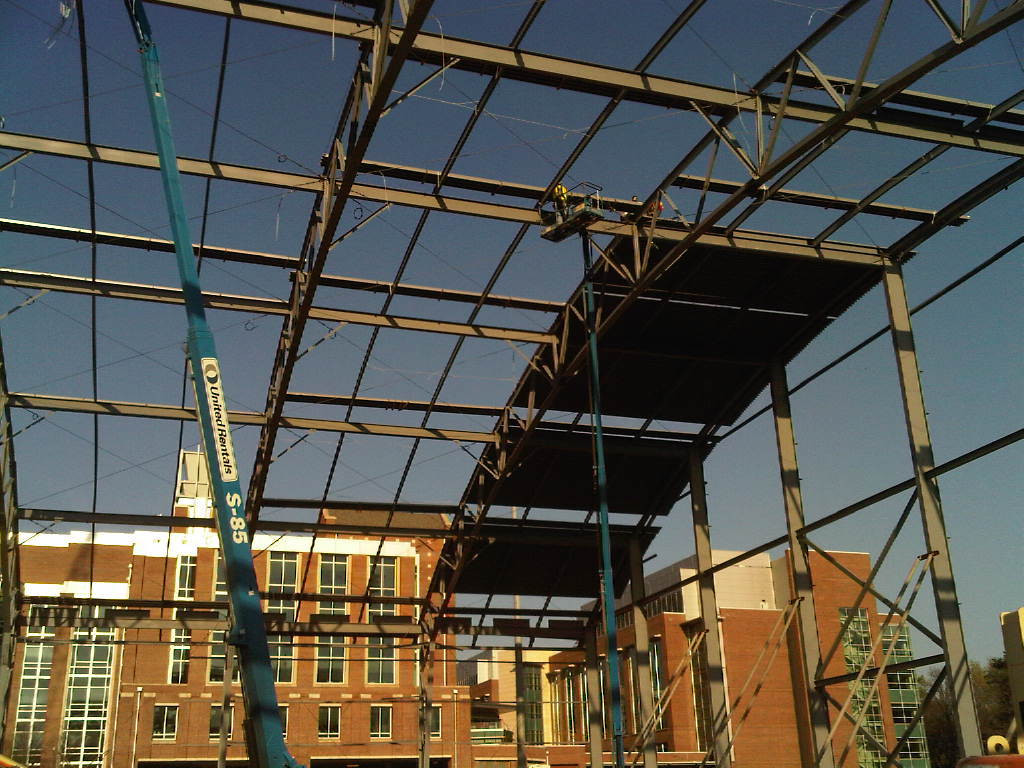 Week 12 - Photo taken on March 22, 2011 - Roof decking work continues on the Indoor Practice Facility