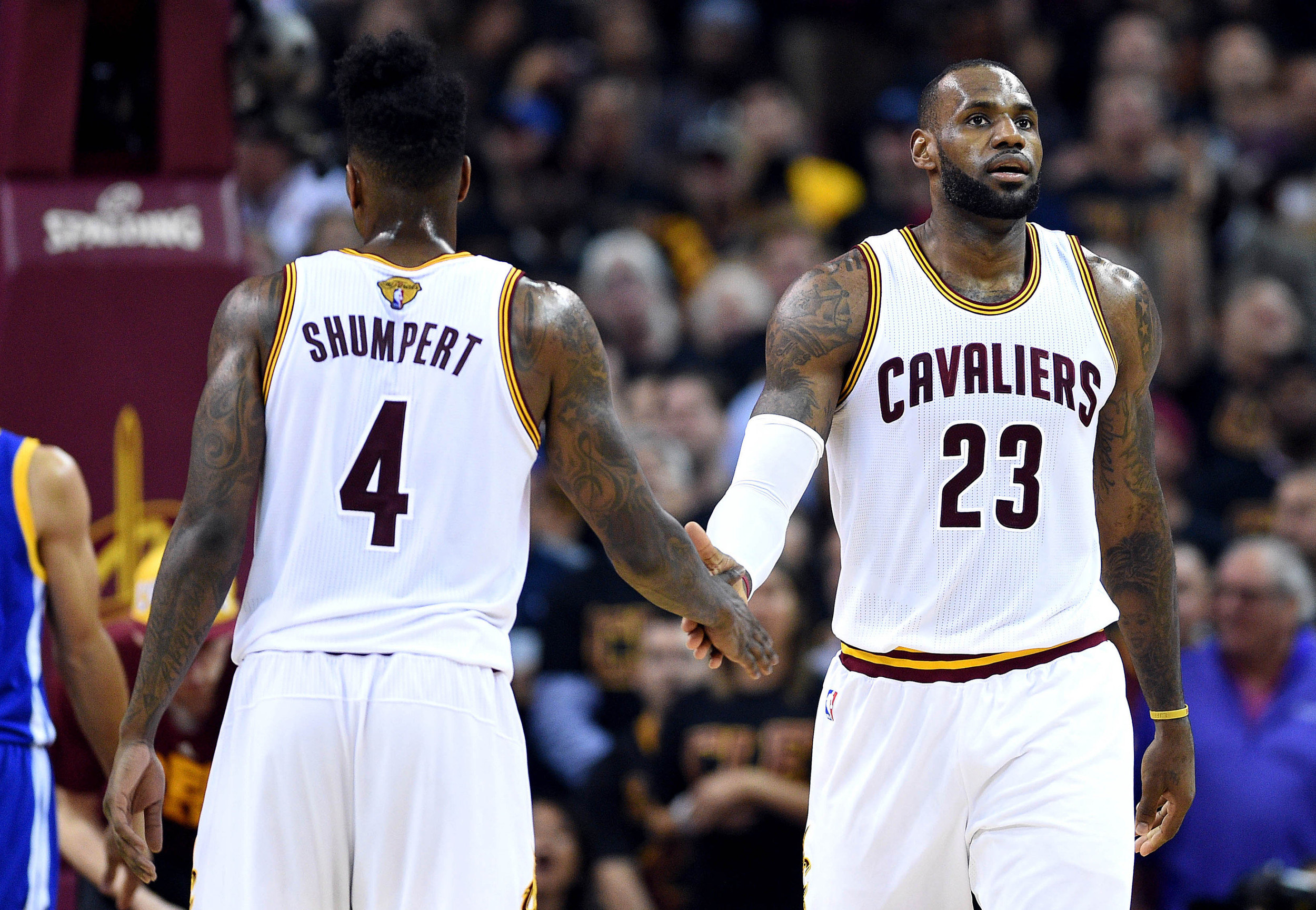 Jun 16, 2016; Cleveland, OH, USA; Cleveland Cavaliers forward LeBron James (23) celebrates with Cleveland Cavaliers guard Iman Shumpert (4) during game six of the NBA Finals. Credit: Bob Donnan-USA TODAY Sports