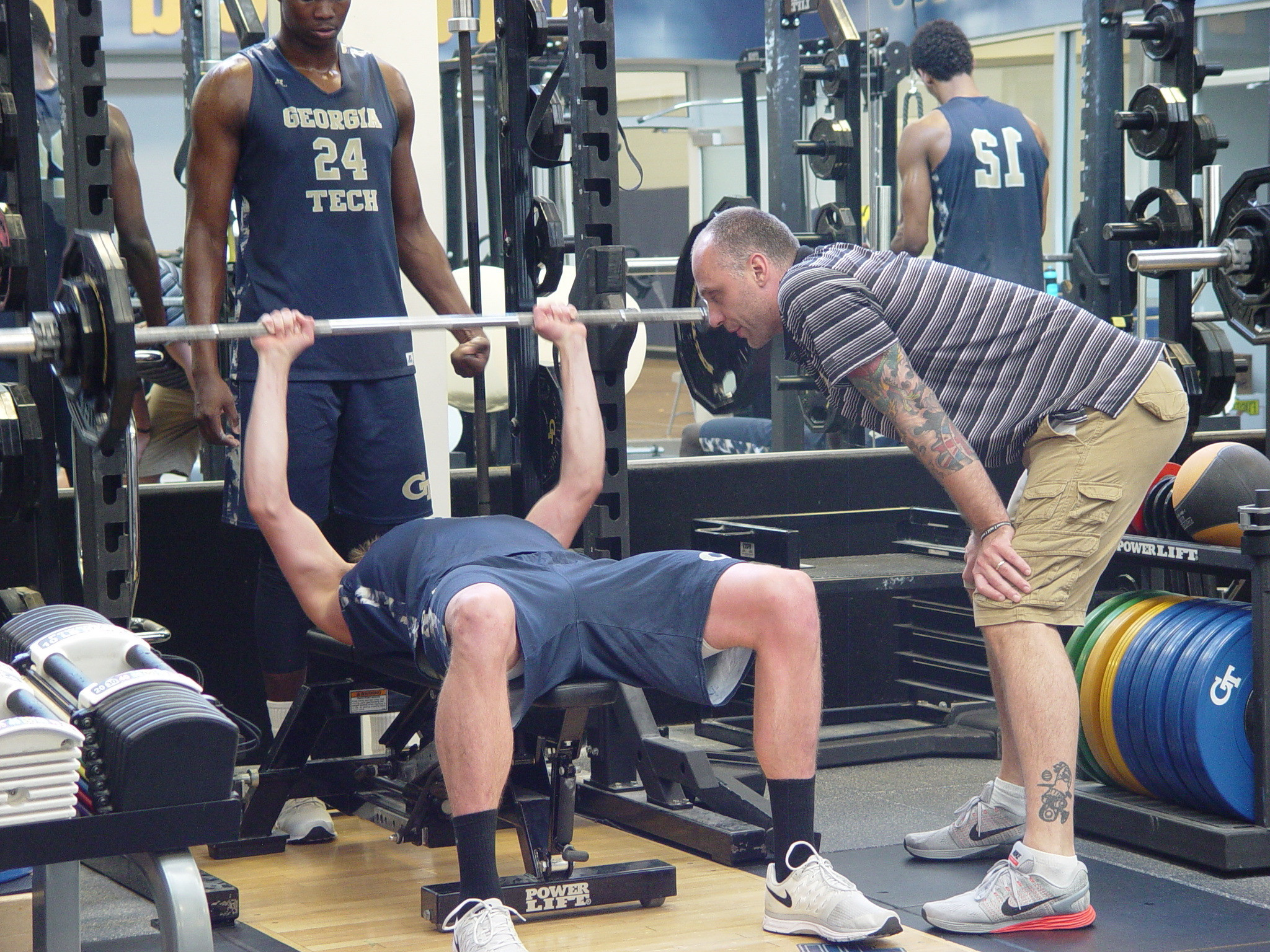Player development coach Dan Taylor takes the Georgia Tech men's basketball team through a workout on June 16, 2016 in the Zelnak Center weight room.