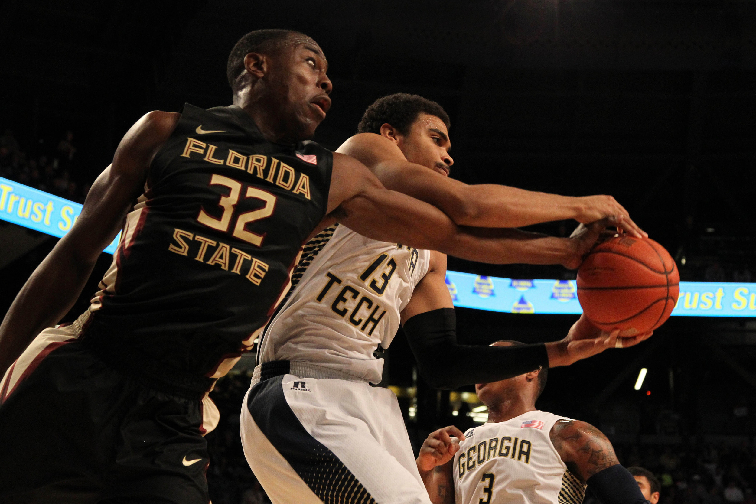 Feb 14, 2015; Atlanta, GA, USA; Florida State Seminoles guard Montay Brandon (32) fights for a rebound with Georgia Tech Yellow Jackets forward Robert Sampson (13) in the first half at McCamish Pavilion.