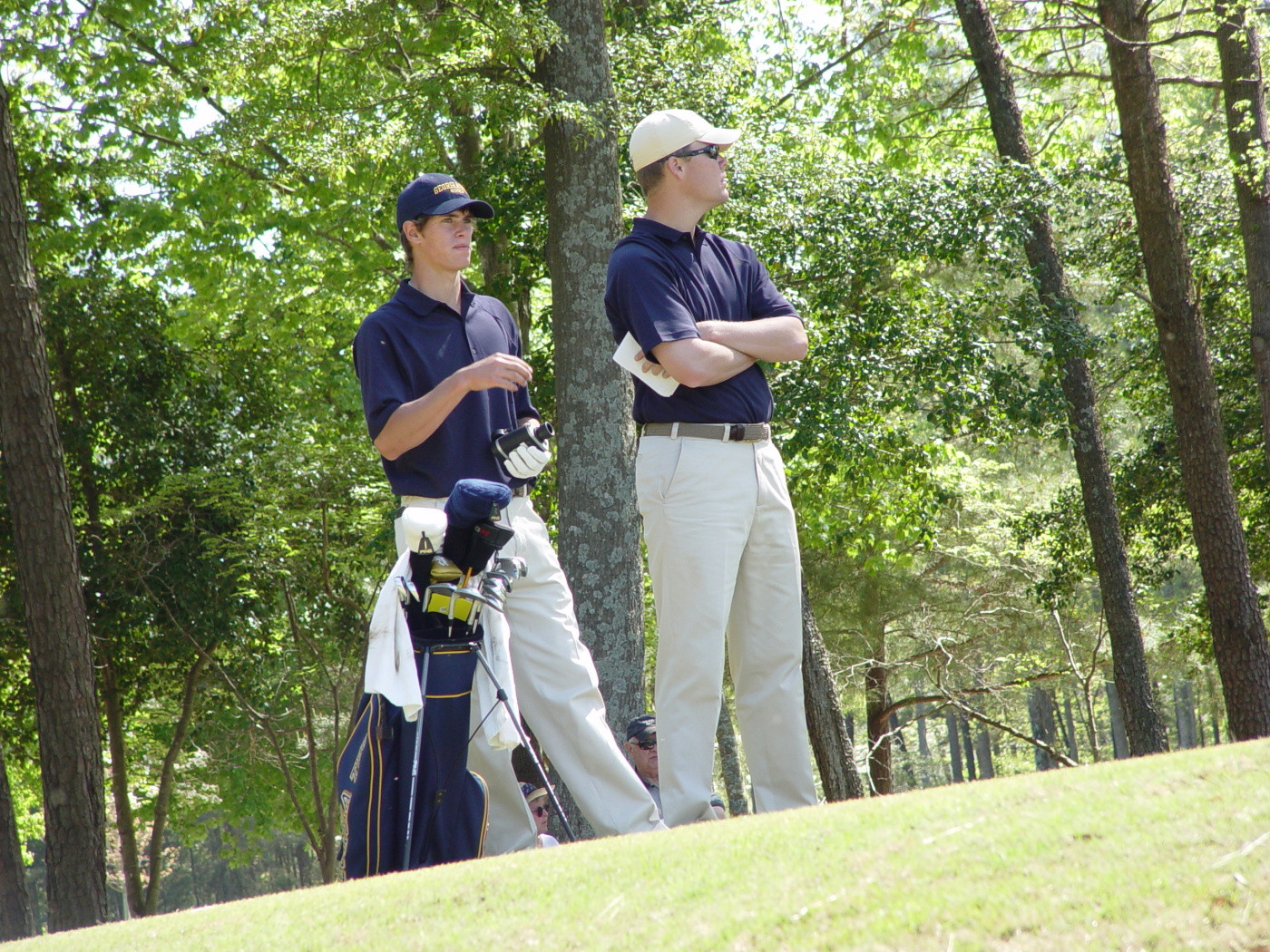 James White consults with assistant coach Christian Newton at the 17th tee in the first round of ACC Golf Championship - April 17, 2009