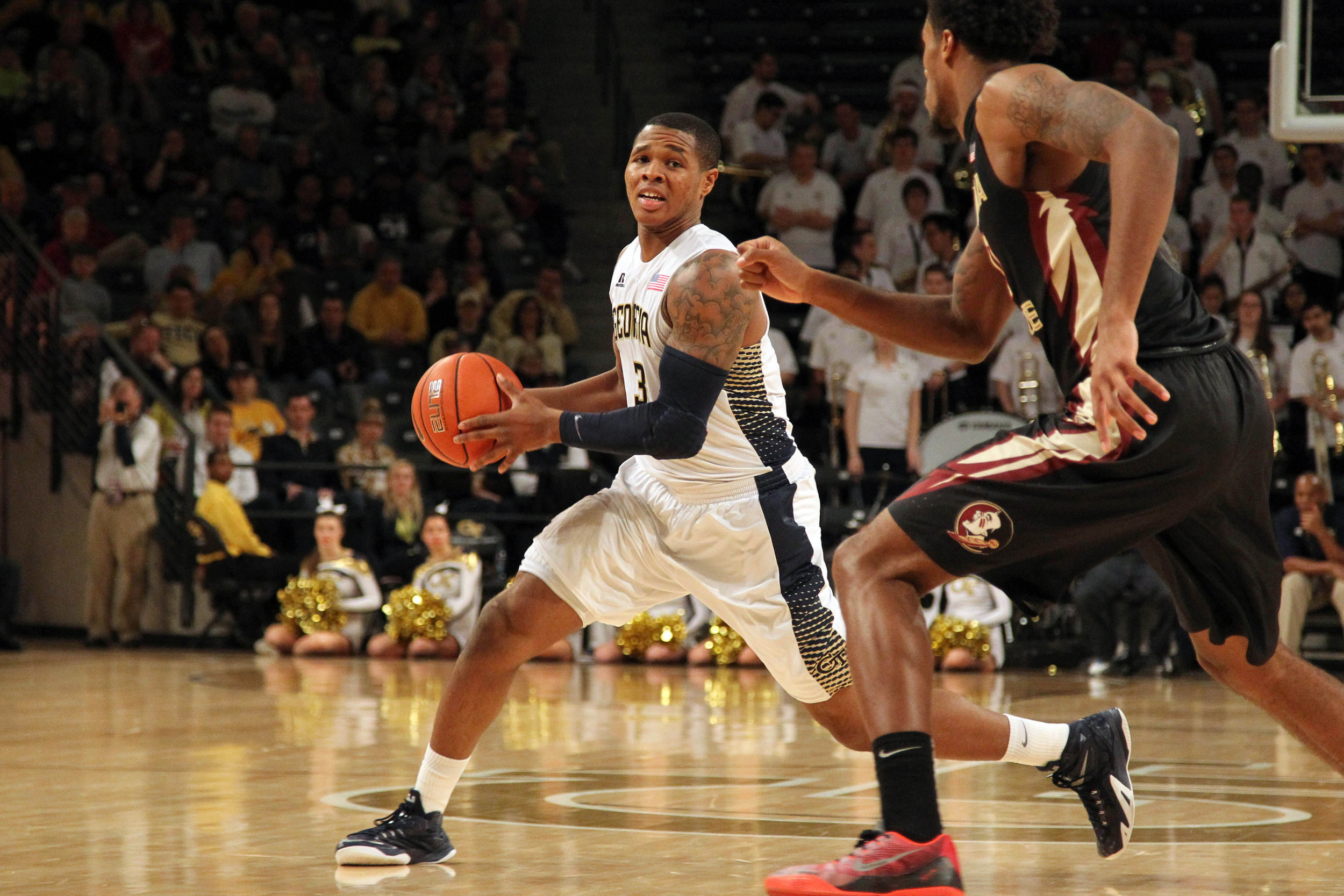 Feb 14, 2015; Atlanta, GA, USA; Georgia Tech Yellow Jackets forward Marcus Georges-Hunt (3) passes the ball against the Florida State Seminoles in the second half at McCamish Pavilion. Florida State defeated Georgia Tech 57-53.