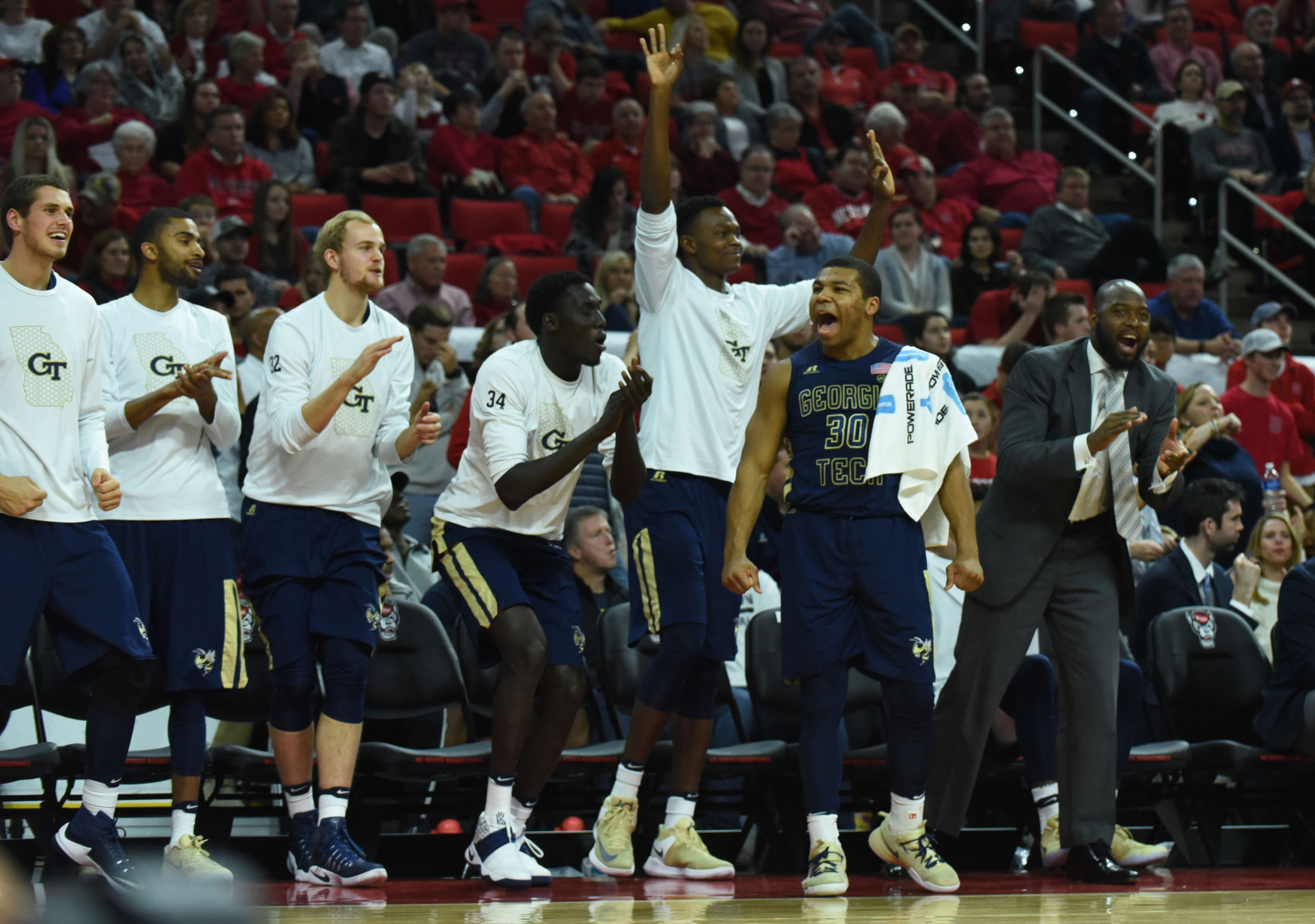 The Georgia Tech Yellow Jackets bench reacts during the second half against the North Carolina State Wolfpack. The Yellow Jackets won 86-76. Credit: Rob Kinnan-USA TODAY Sports