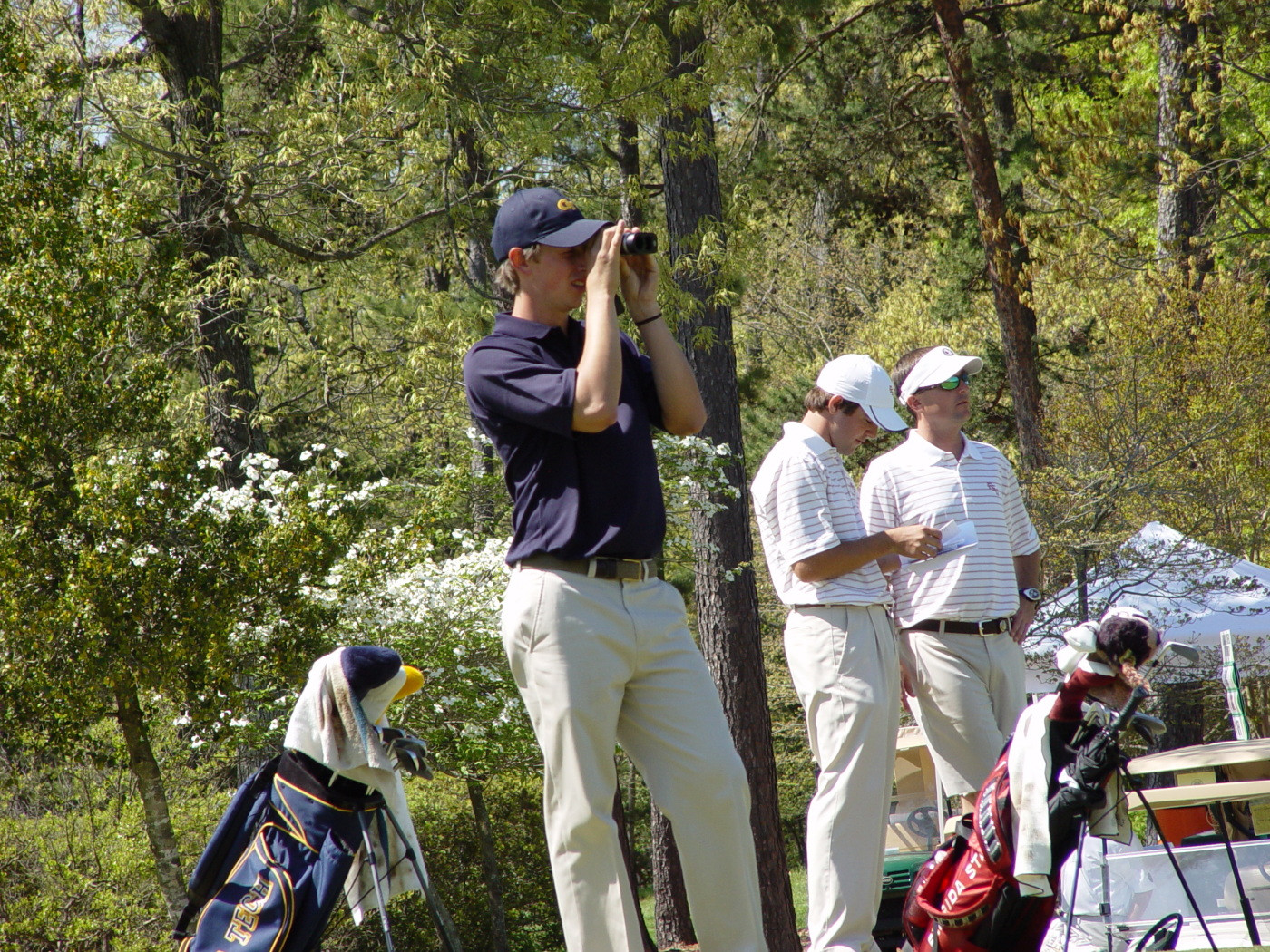 John-Tyler Griffin looks through his rangefinder at 14 in the first round of ACC Golf Championship - April 17, 2009