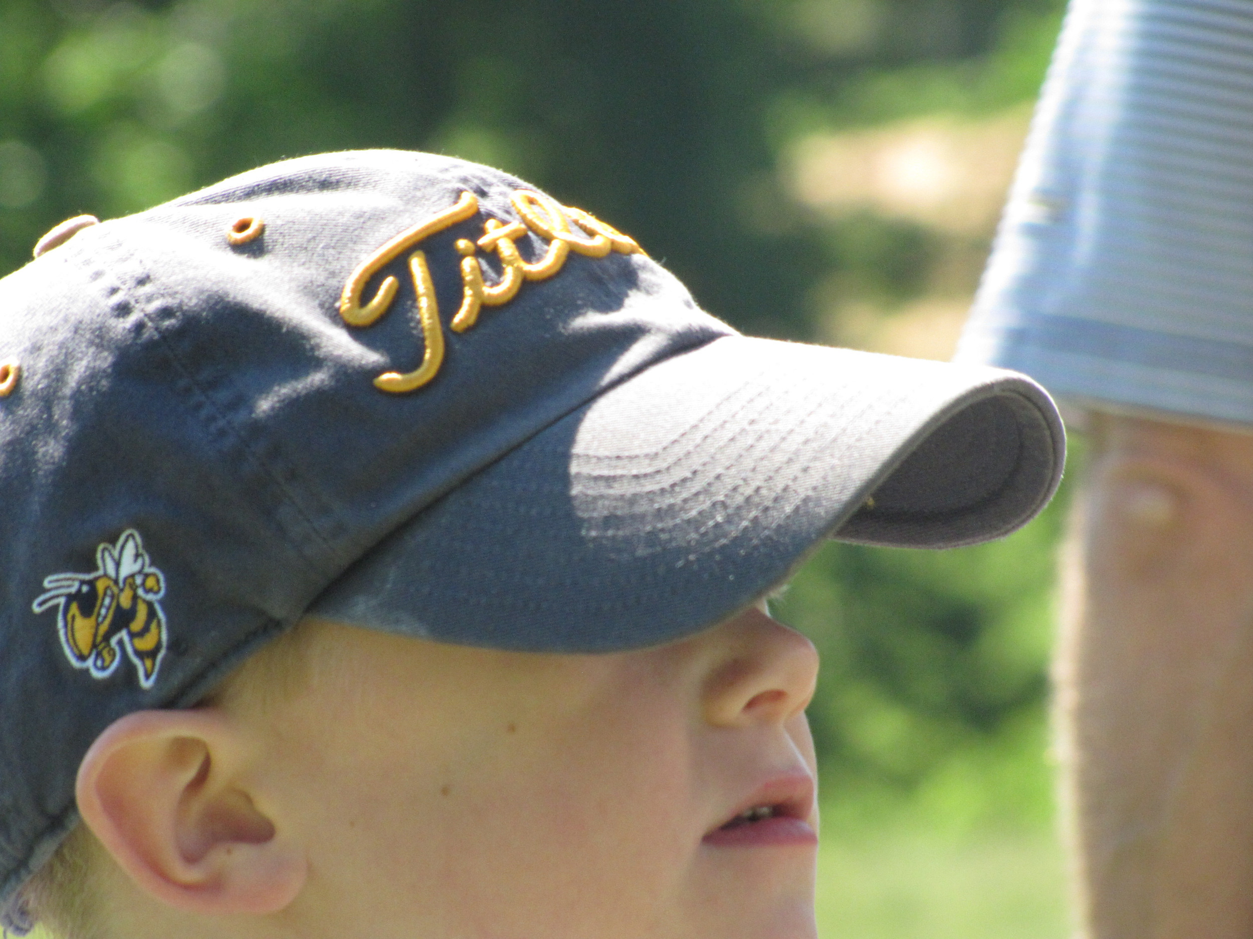 A young Tech fan watches the action during the final round of the NCAA Raleigh Regional.